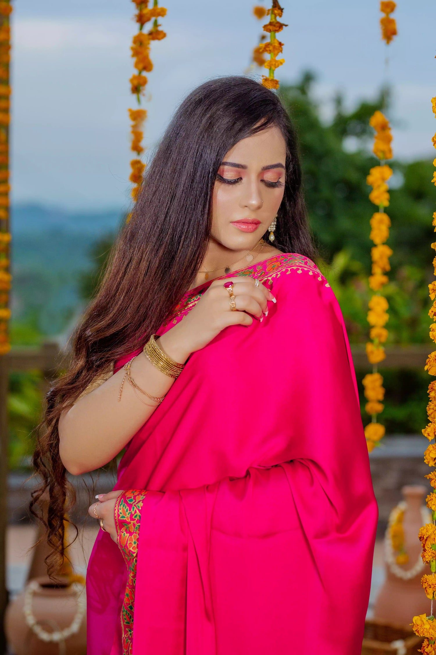 Elegant silk block printed saree with intricate border designs and heavy block printed pallu, paired with a tila embroidered blouse. Perfect for formal events.