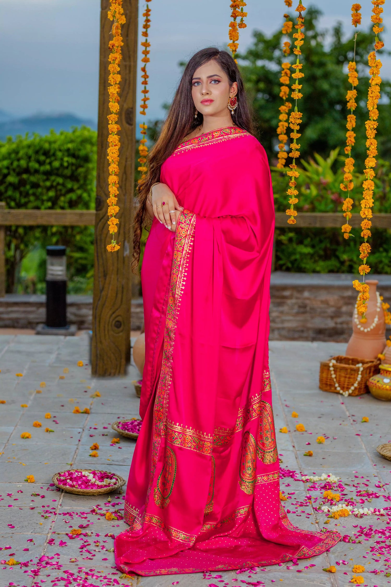 Elegant silk block printed saree with intricate border designs and heavy block printed pallu, paired with a tila embroidered blouse. Perfect for formal events.