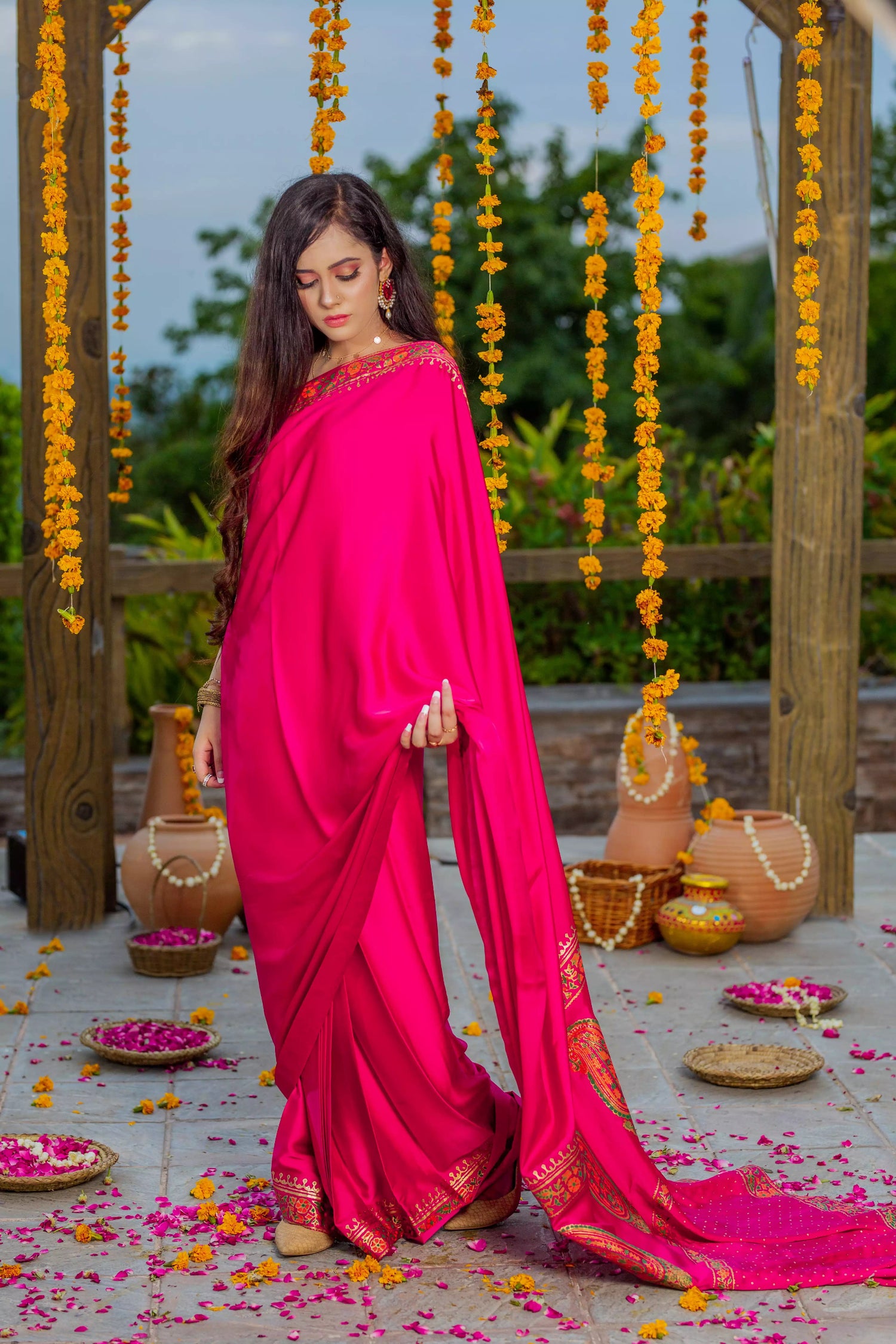 Elegant silk block printed saree with intricate border designs and heavy block printed pallu, paired with a tila embroidered blouse. Perfect for formal events.