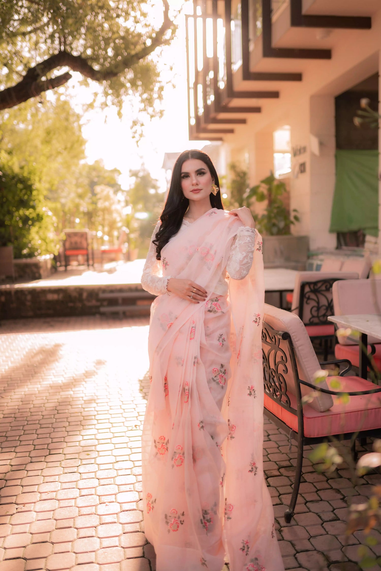 Powder pink embroidered cotton net saree with floral motifs, shown with optional stitched chiffon blouse and matching inner, perfect for weddings and formal occasions.