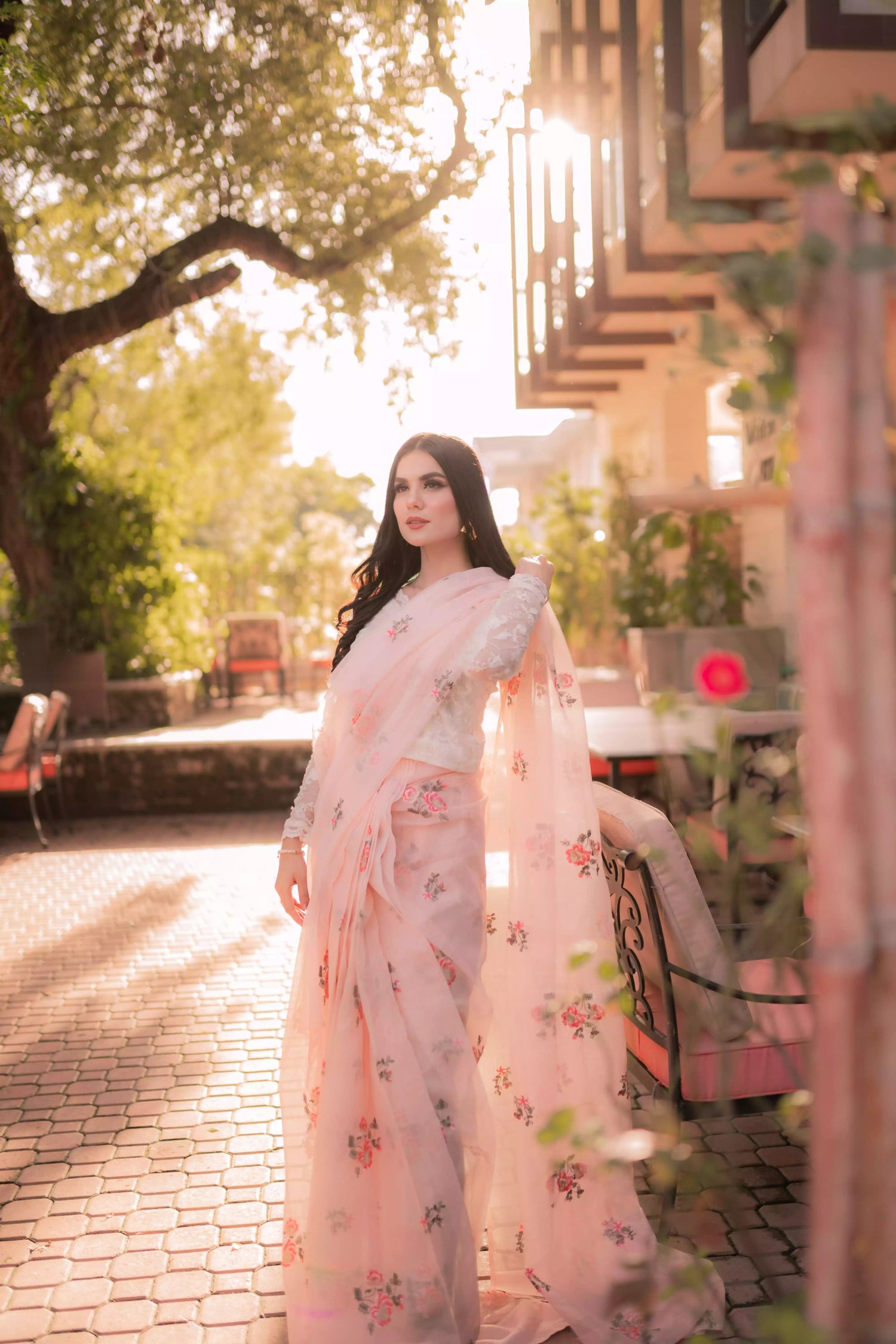 Powder pink embroidered cotton net saree with floral motifs, shown with optional stitched chiffon blouse and matching inner, perfect for weddings and formal occasions.