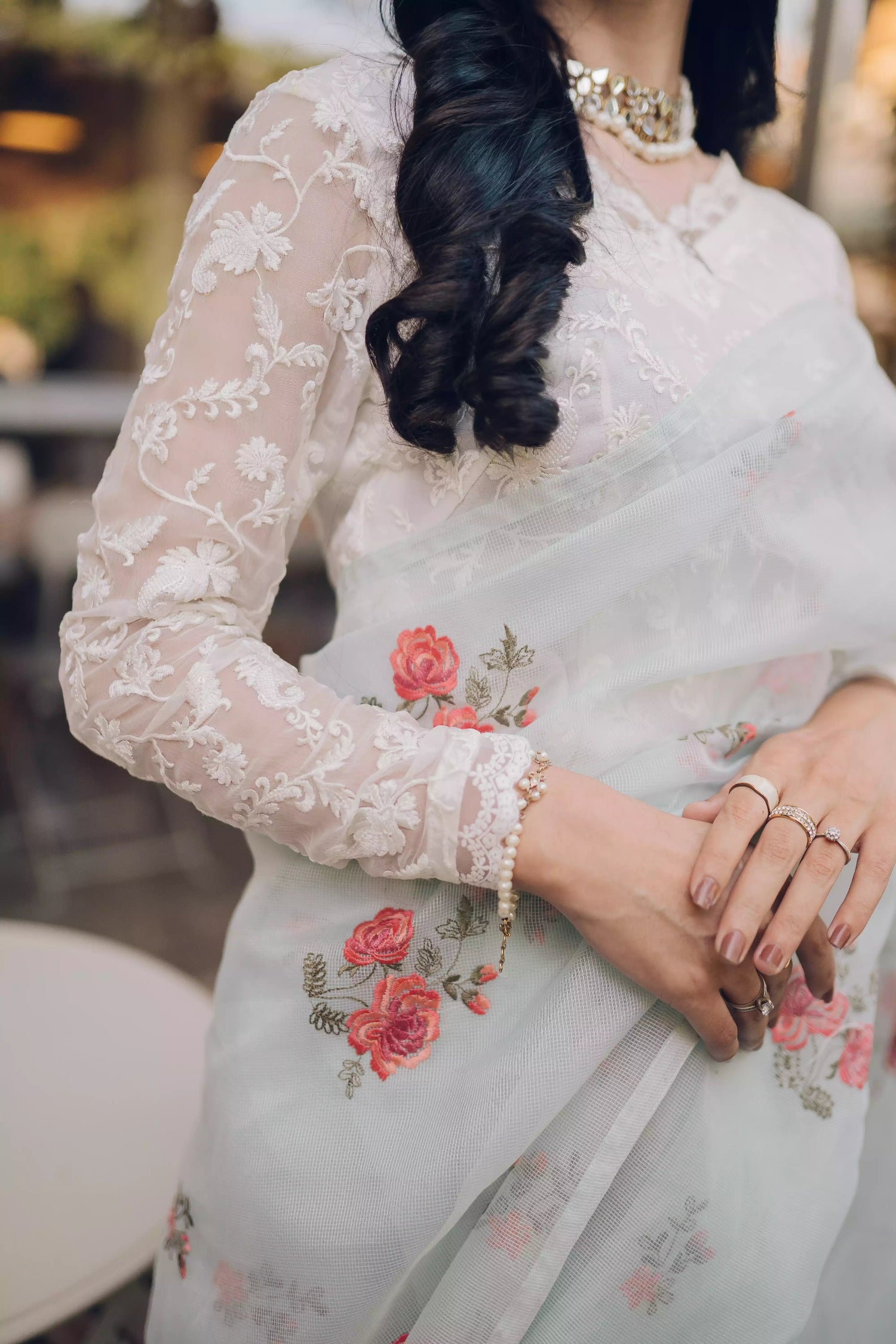 The serene ice blue saree with elegant drape with delicate intricate floral details.
