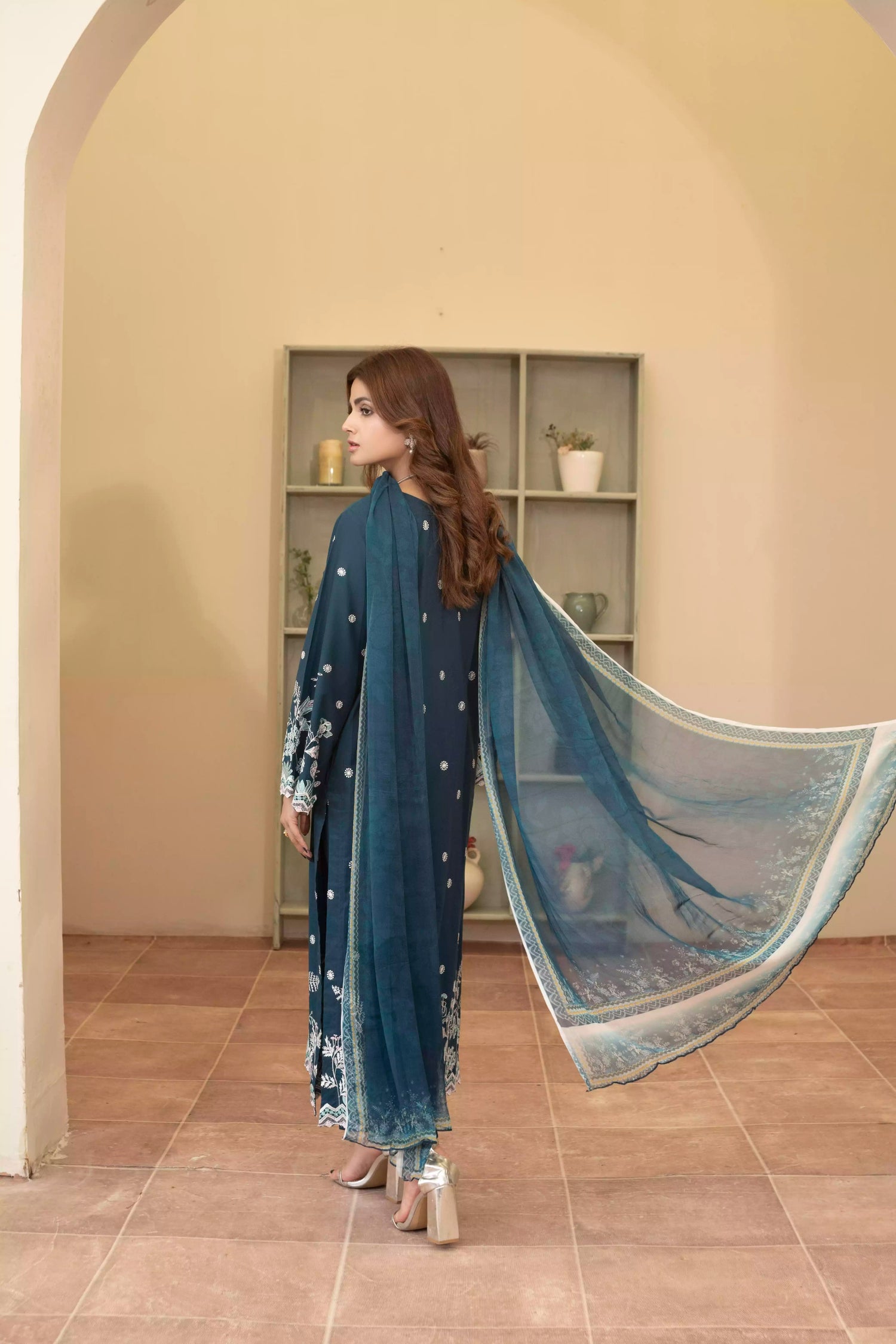 Elegant zinc blue embroidered suit featuring detailed white motifs, complemented by a chiffon dupatta.