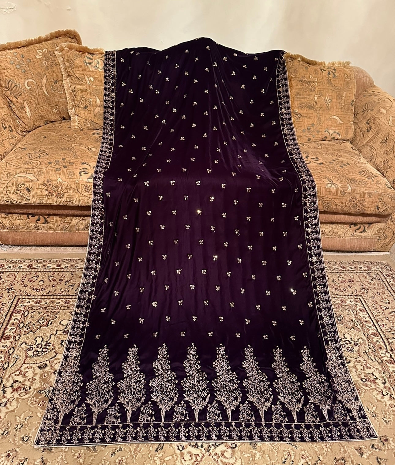 Black velvet shawl with intricate tila and sequin embroidery, featuring tree motif bunches on the pallu and four-sided embroidered borders, finished with a luxurious Jamawar palta.