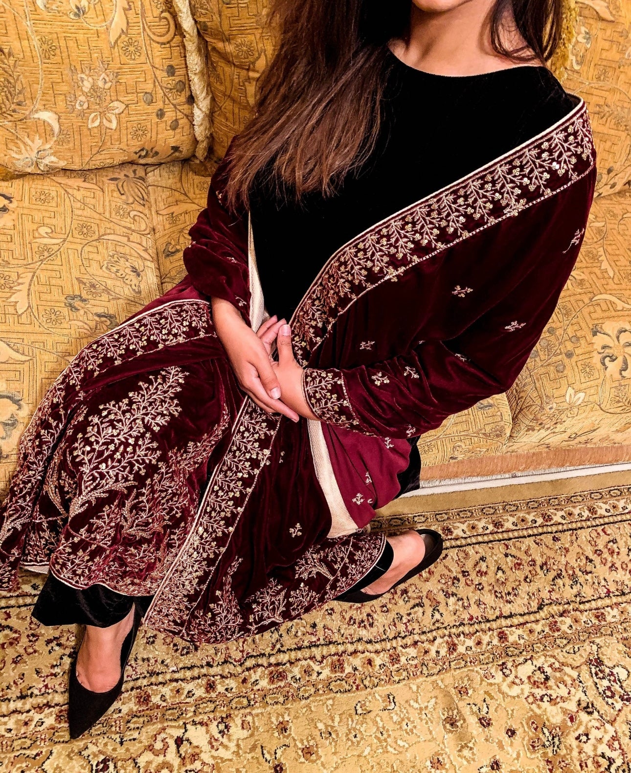 Black velvet shawl with intricate tila and sequin embroidery, featuring tree motif bunches on the pallu and four-sided embroidered borders, finished with a luxurious Jamawar palta.