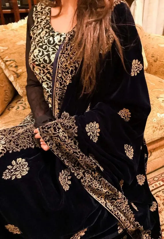 Luxurious Navy Blue Velvet Shawl with floral block border on four sides, small screen motifs in center adored with golden thread edges, showcasing elegance and perfect for weddings, festive occasions. 