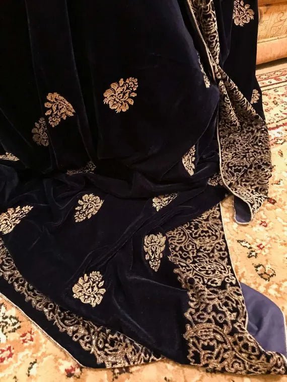 Luxurious Navy Blue Velvet Shawl with floral block border on four sides, small screen motifs in center adored with golden thread edges, showcasing elegance and perfect for weddings, festive occasions.