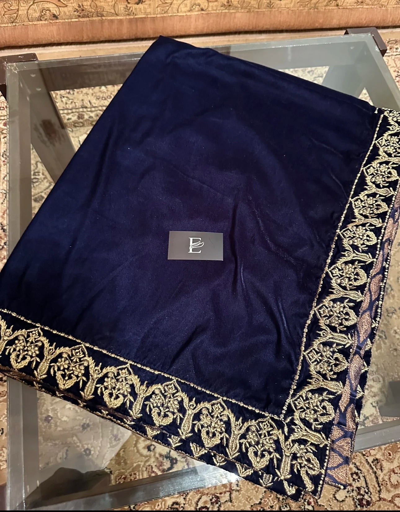 Elegant velvet shawl adored with intricate tila embroidery border and Banarsi palta, ideal for weddings, festive events and formal wear.