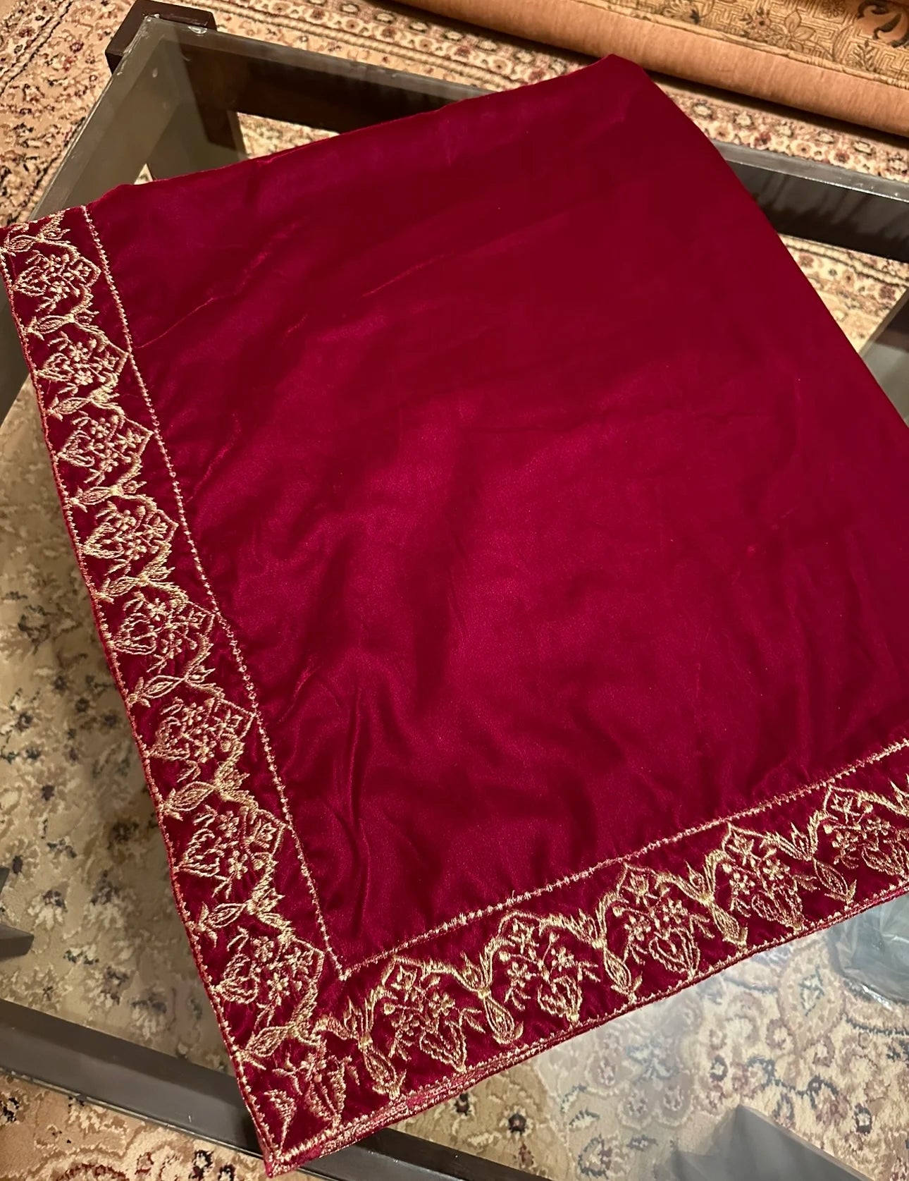 Elegant velvet shawl adored with intricate tila embroidery border and Banarsi palta, ideal for weddings, festive events and formal wear.