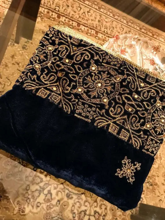 Beautifully crafted velvet shawl featuring intricate gold tila embroidery complemented with chata work and a Banarsi border exuding sophistication, perfect for formal events.