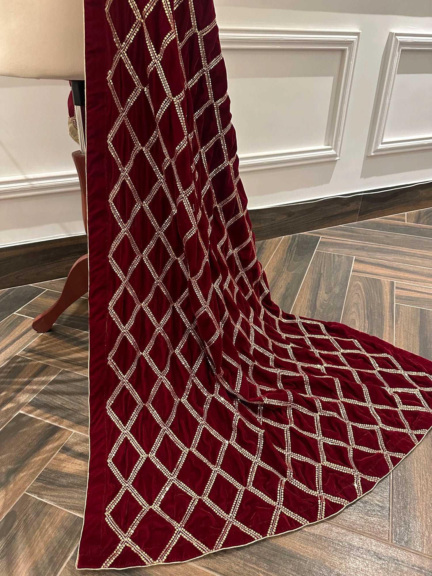 Cross Sequence Regal Shawl crafted from high quality velvet, featuring delicate tila embroidery with shimmering sequence work, perfect for festive and formal occasions.