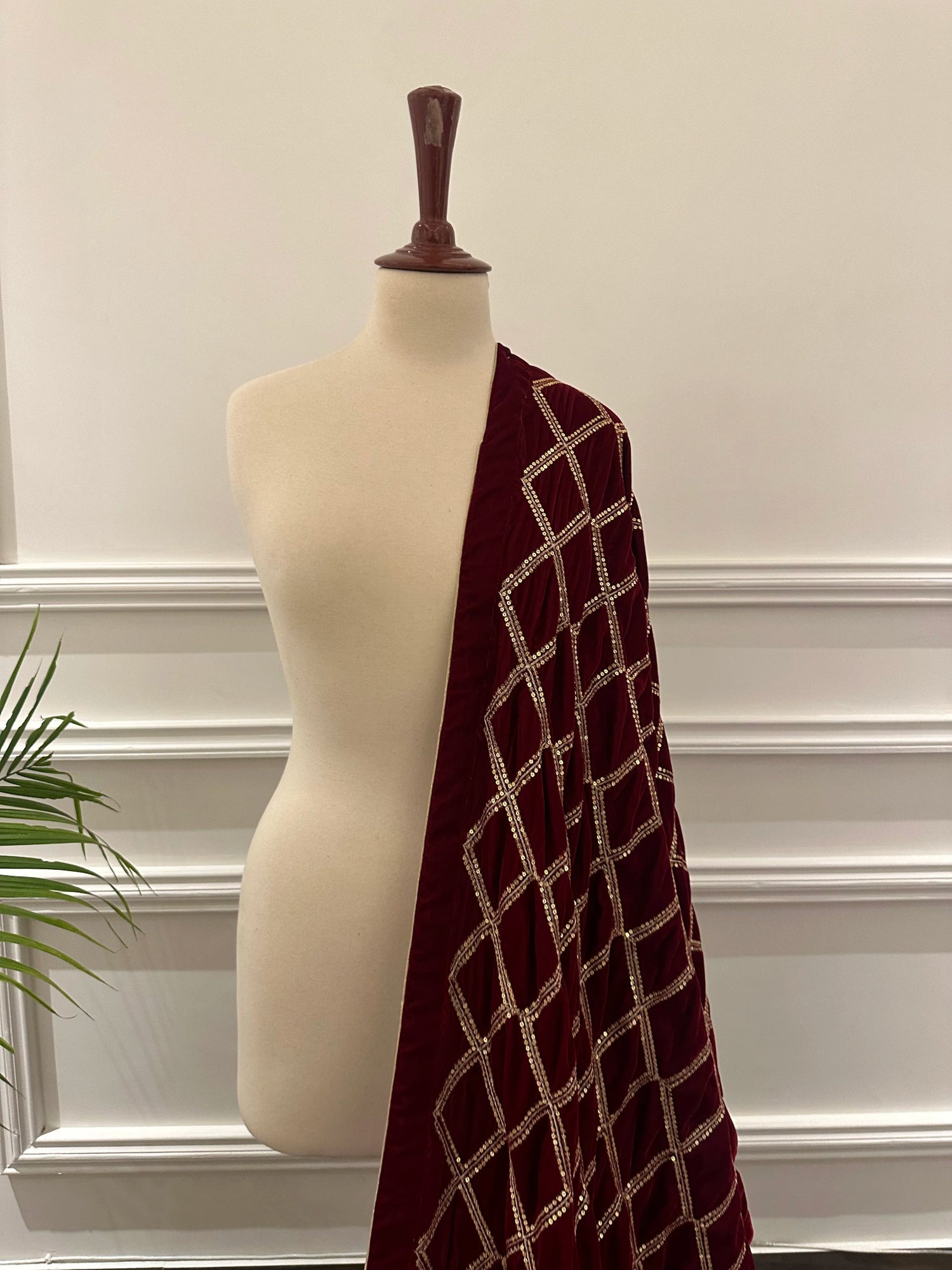 Cross Sequence Regal Shawl crafted from high quality velvet, featuring delicate tila embroidery with shimmering sequence work, perfect for festive and formal occasions.