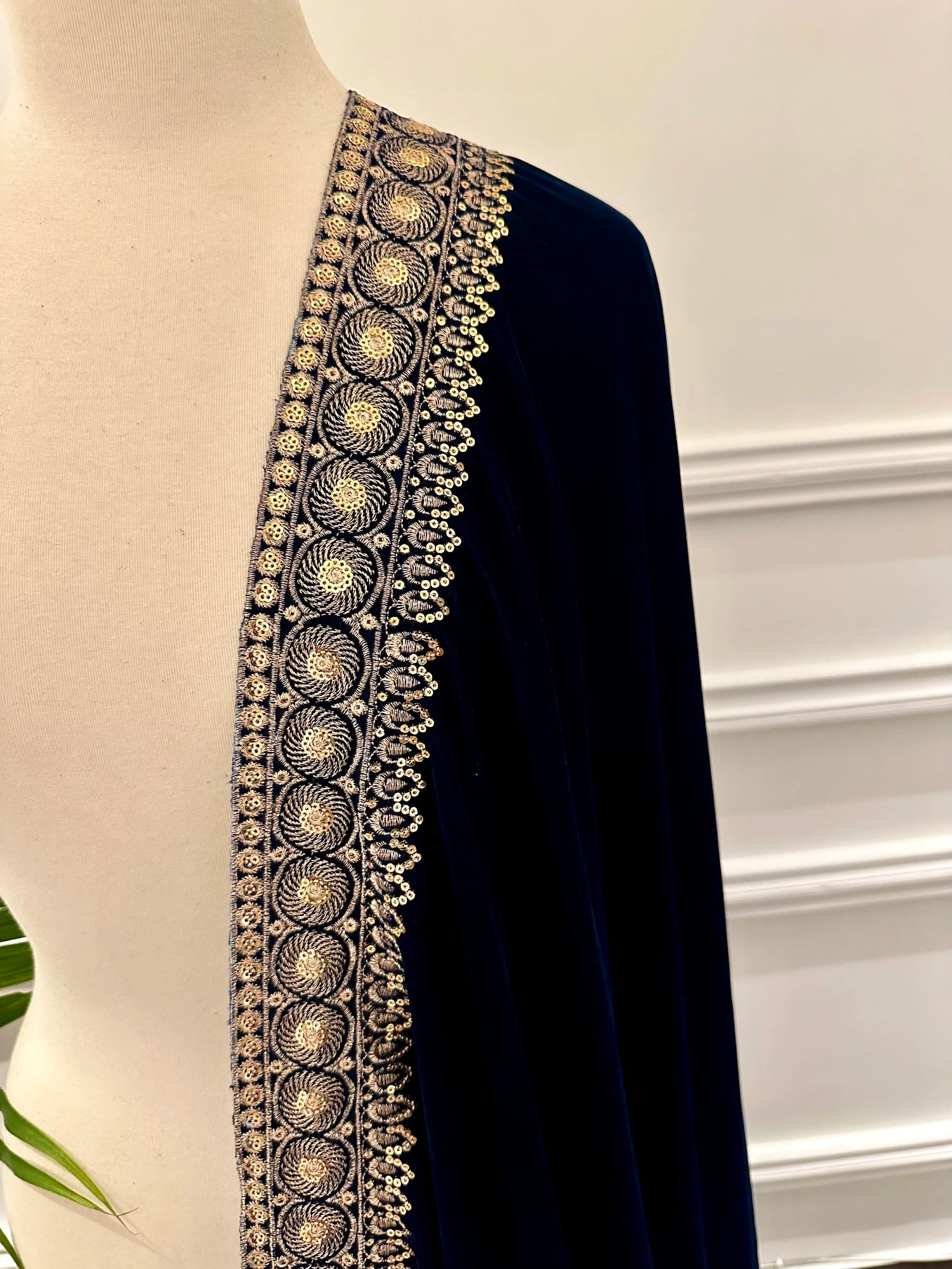 Elegant Heavy Tila Work Velvet Shawl featuring intricate abstract tila embroidery on a rich velvet base. Designed as a unisex statement piece, the shawl showcases heavy hand-embroidered, perfect for weddings and formal occasions.