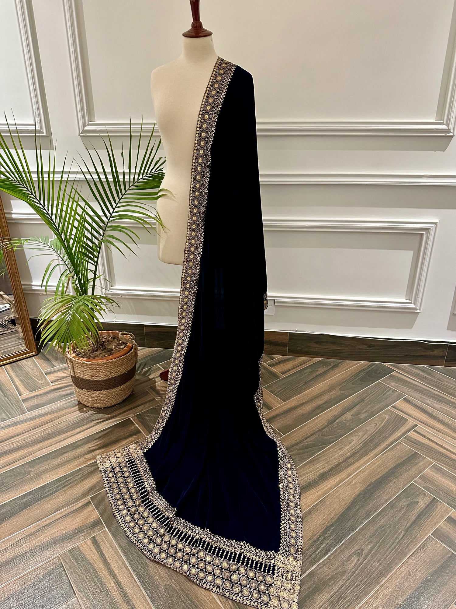 Elegant Heavy Tila Work Velvet Shawl featuring intricate abstract tila embroidery on a rich velvet base. Designed as a unisex statement piece, the shawl showcases heavy hand-embroidered, perfect for weddings and formal occasions.