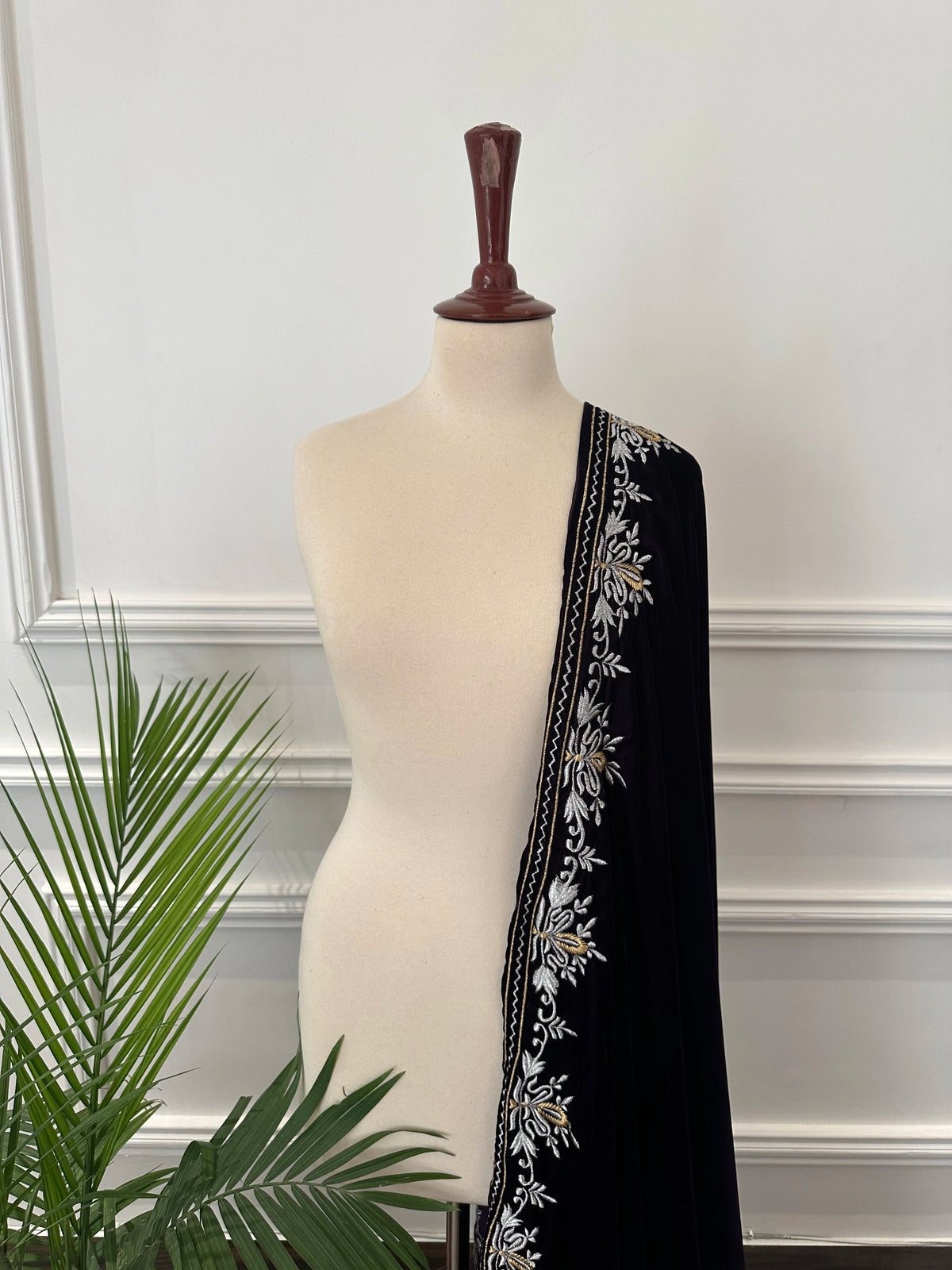 Elevate your style with velvet shawl, handcrafted silver and gold floral embroidery along the border, featuring a rich texture and elegant drape, perfect for weddings and festive occasions.