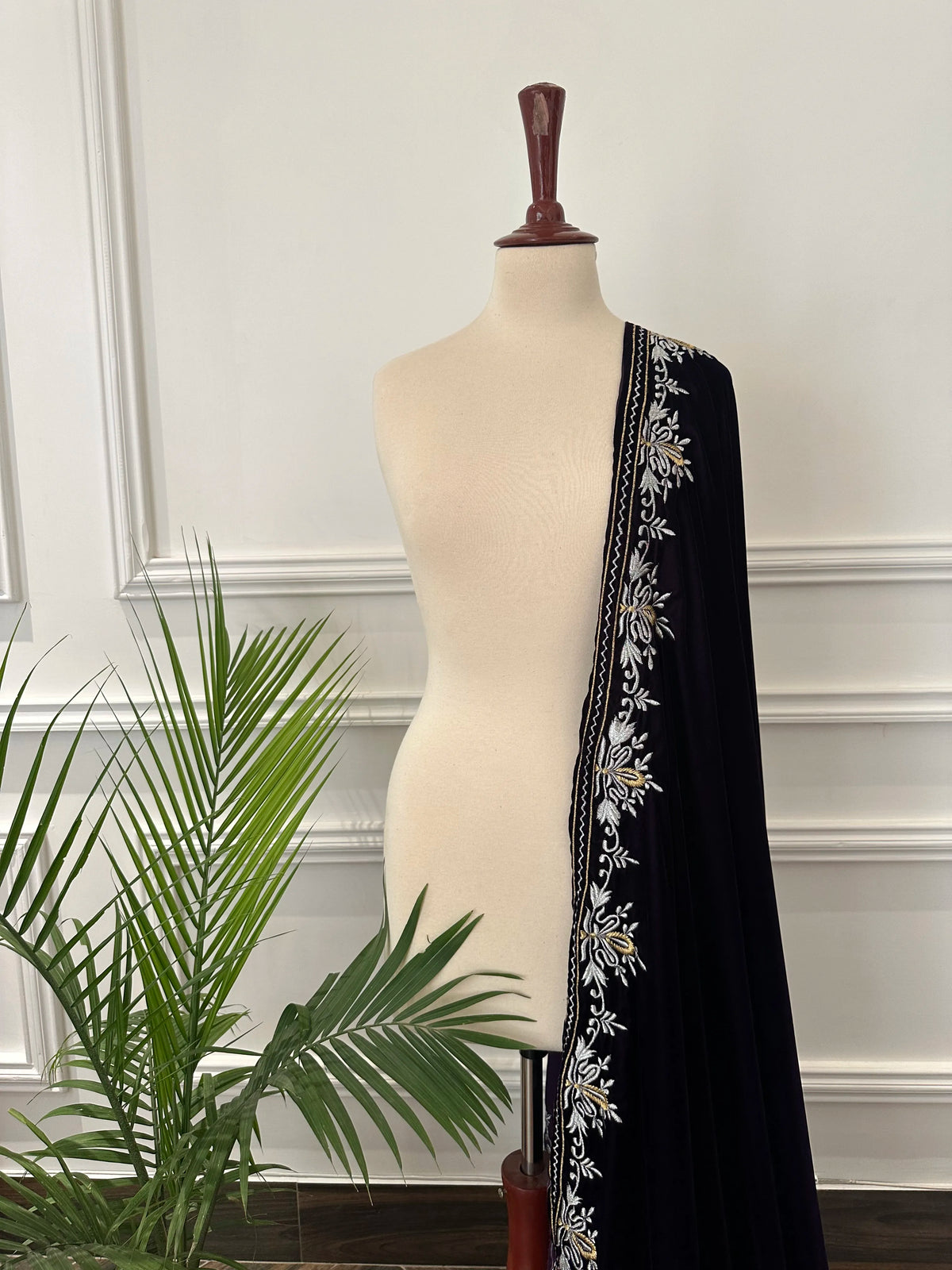 Elevate your style with velvet shawl, handcrafted silver and gold floral embroidery along the border, featuring a rich texture and elegant drape, perfect for weddings and festive occasions.