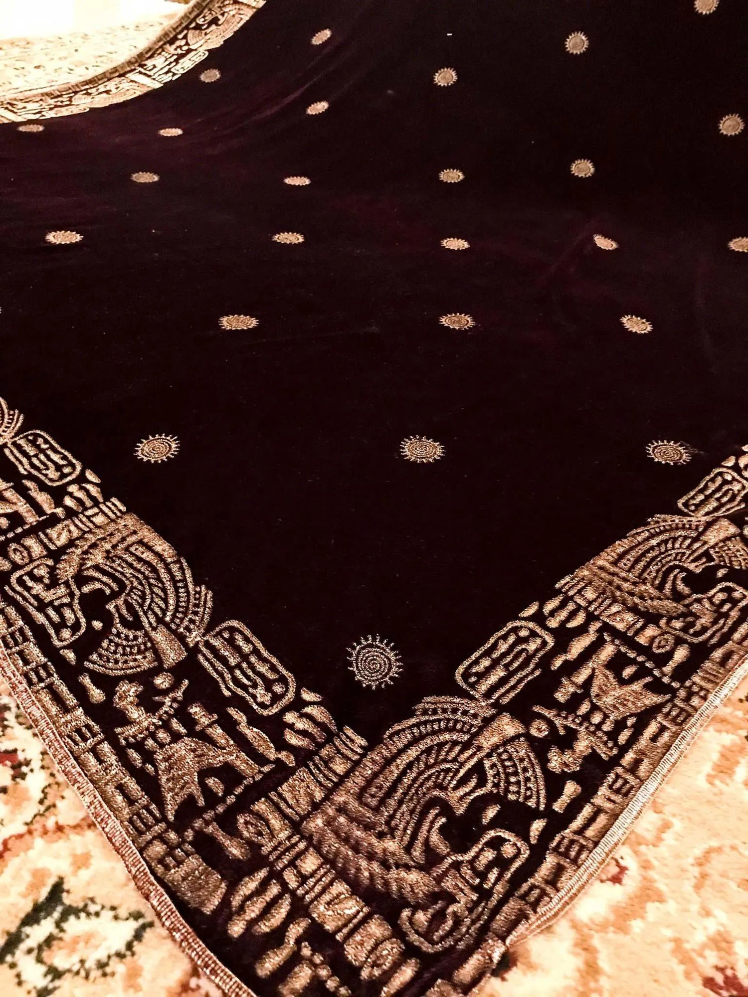 Elegant velvet shawl featuring intricate motifs with block printed border showcasing luxurious finish, ideal for stylish gatherings and formal events.