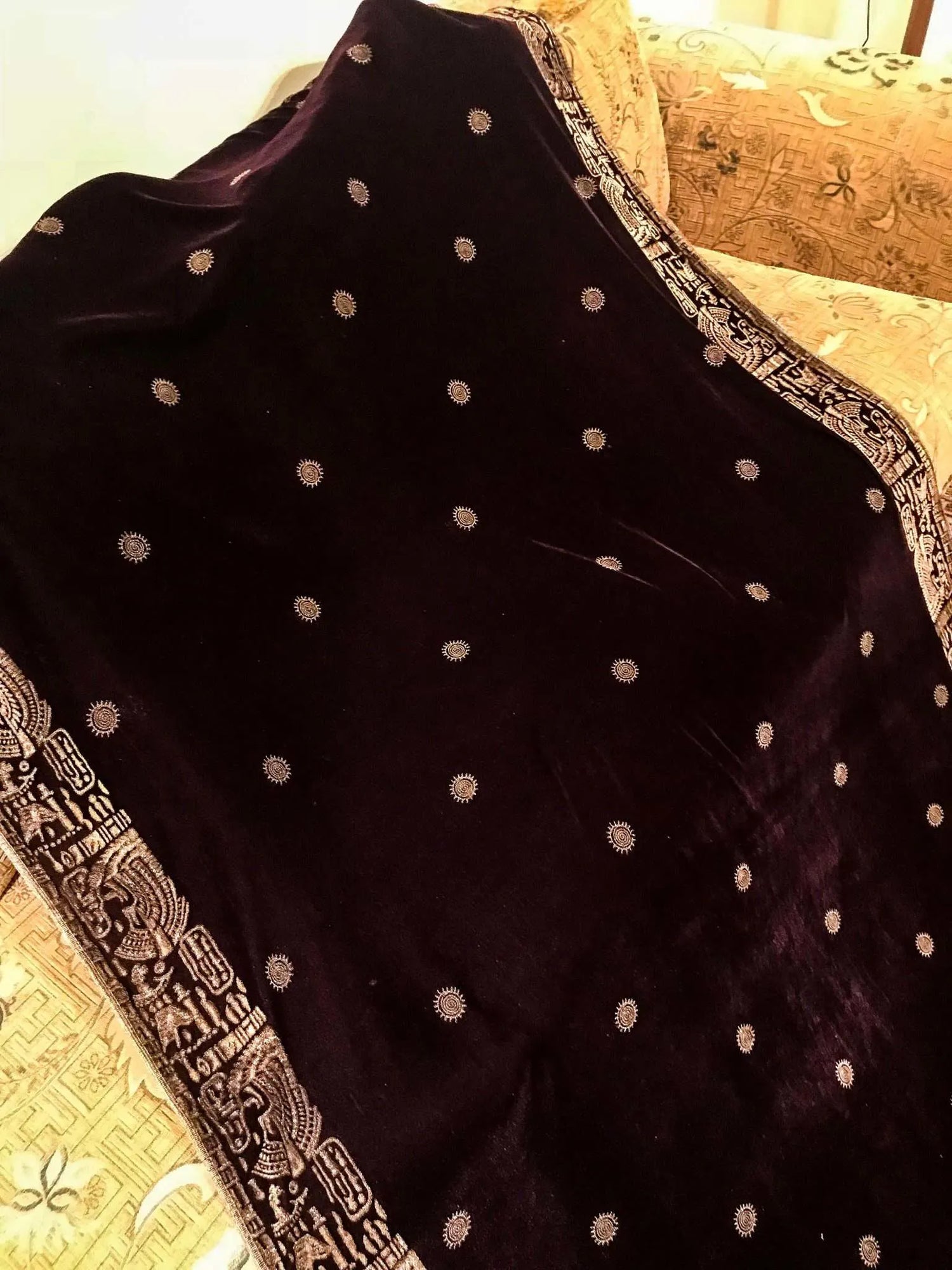 Elegant velvet shawl featuring intricate motifs with block printed border showcasing luxurious finish, ideal for stylish gatherings and formal events.