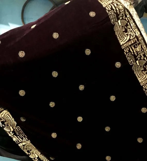 Elegant velvet shawl featuring intricate motifs with block printed border showcasing luxurious finish, ideal for stylish gatherings and formal events.