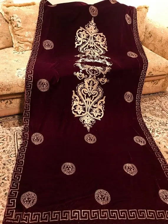 Luxurious velvet shawl adorned with gold block printed motif, showcasing elegant geometric patterns and Versace-inspired designs.