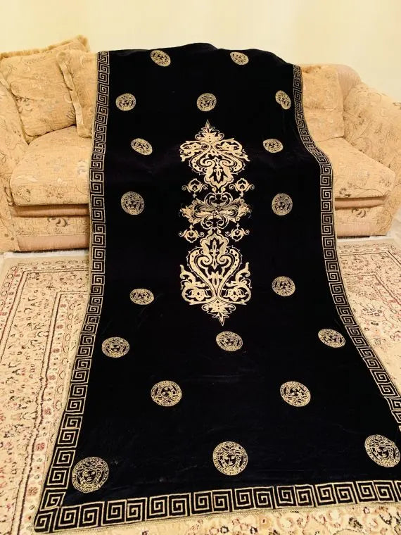 Luxurious velvet shawl adorned with gold block printed motif, showcasing elegant geometric patterns and Versace-inspired designs.