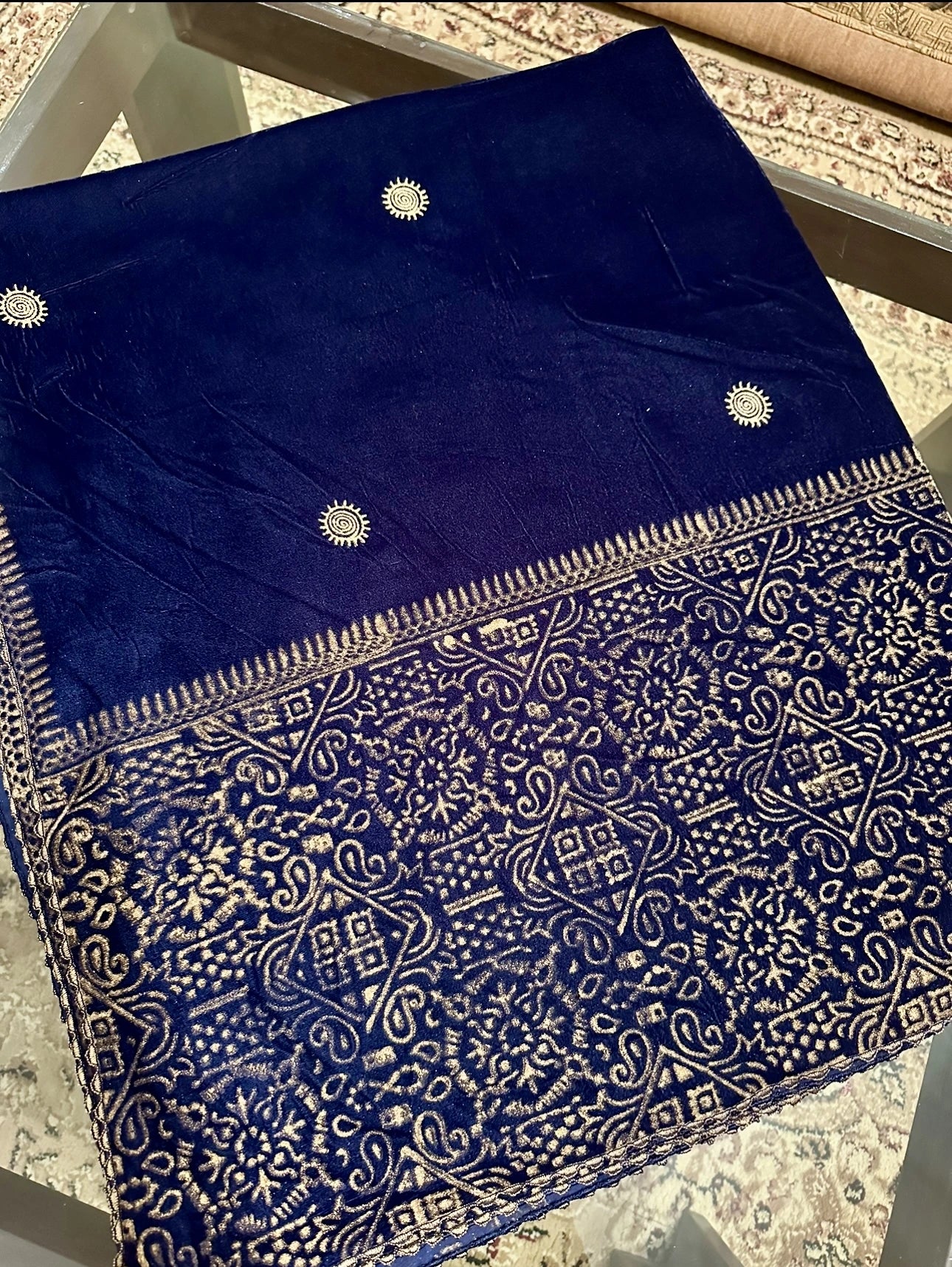 Elegant velvet shawl showcasing  luxurious double geometric block printed border, exuding sophistication and traditional charm.