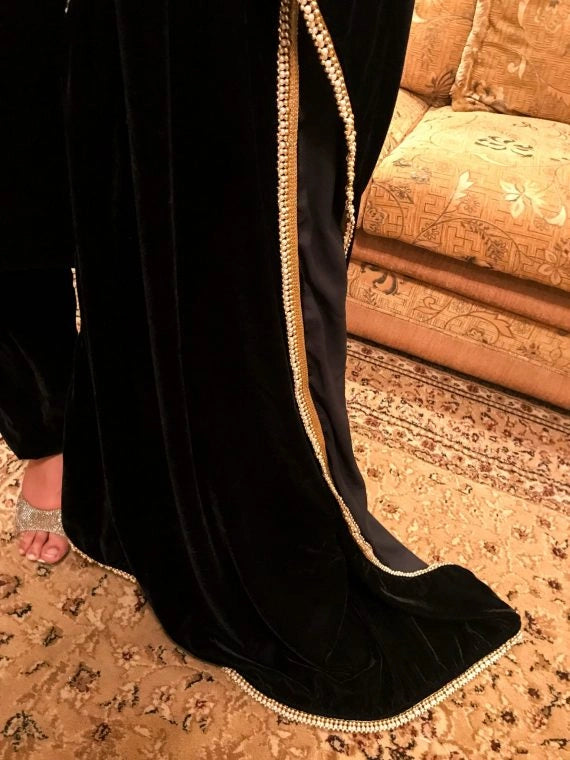 A luxurious pearl lace velvet shawl, exuding elegance, refined style and sophistication.
