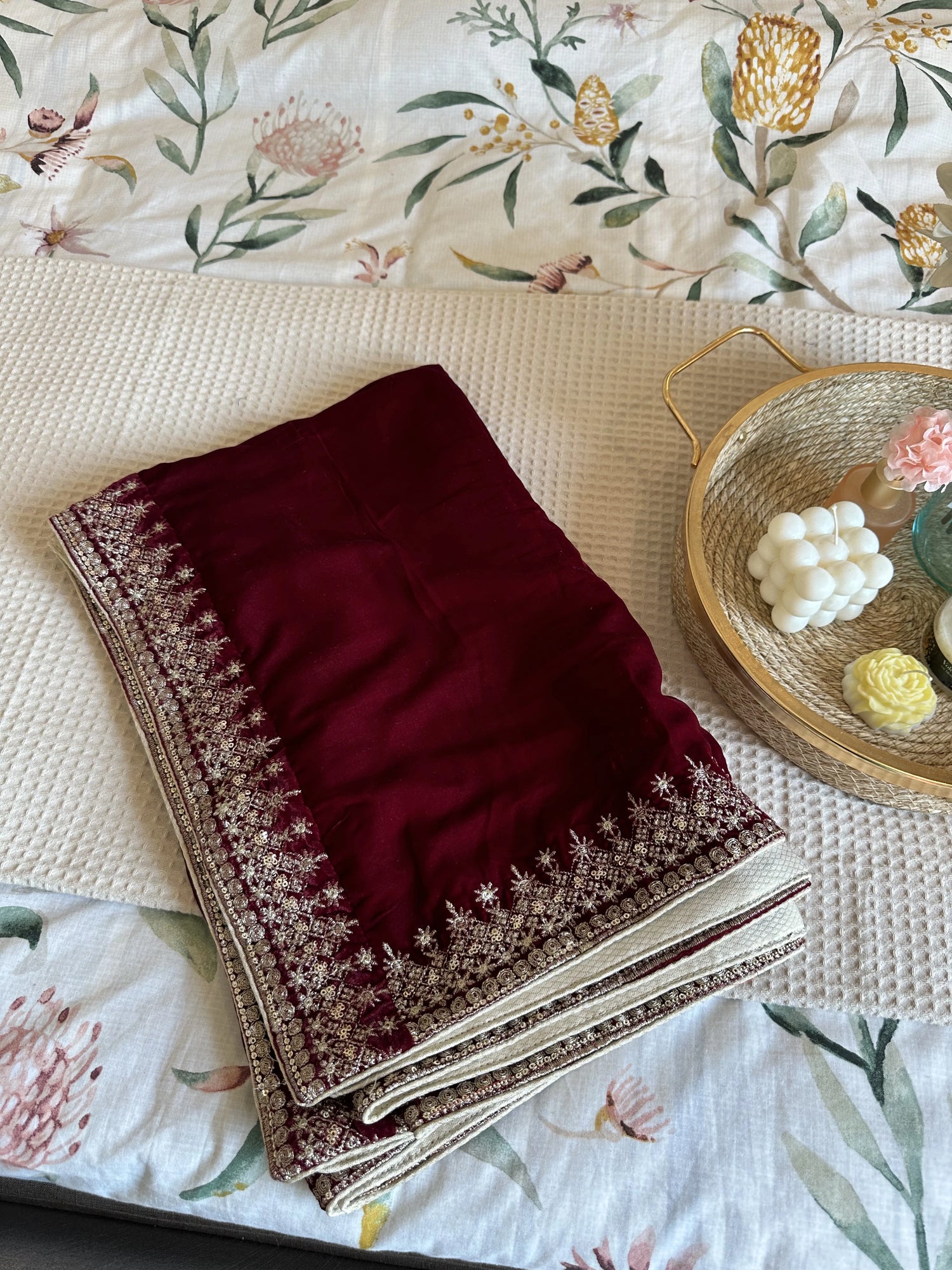 A sophisticated velvet shawl adorned with a luxurious intricate tila embroidery. Perfect for festive occasions and formal events.