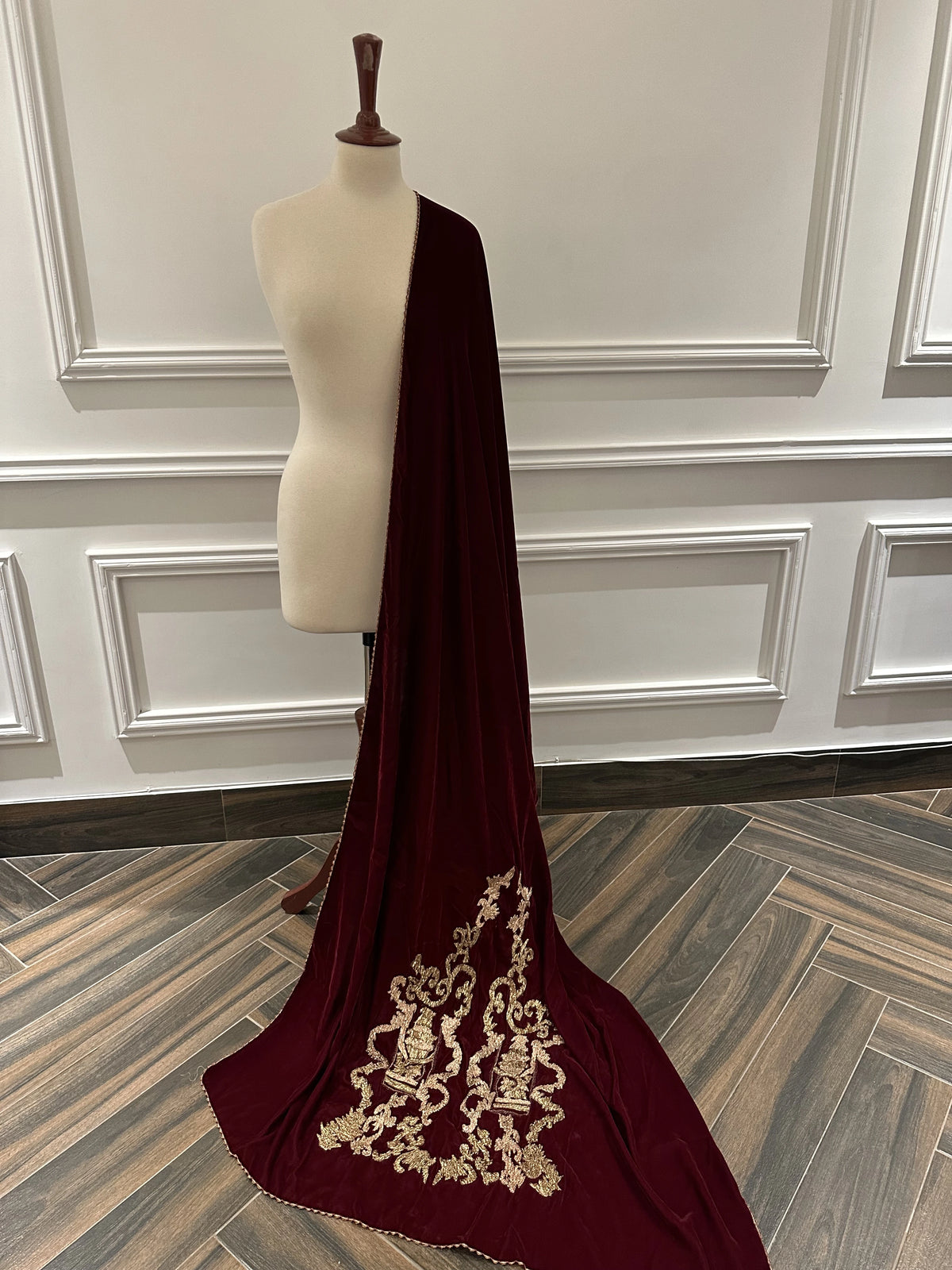 Discover gota embroidered velvet shawl with fully handcrafted motifs on both ends, featuring a rich, elegant finish ideal for weddings and festive wear.