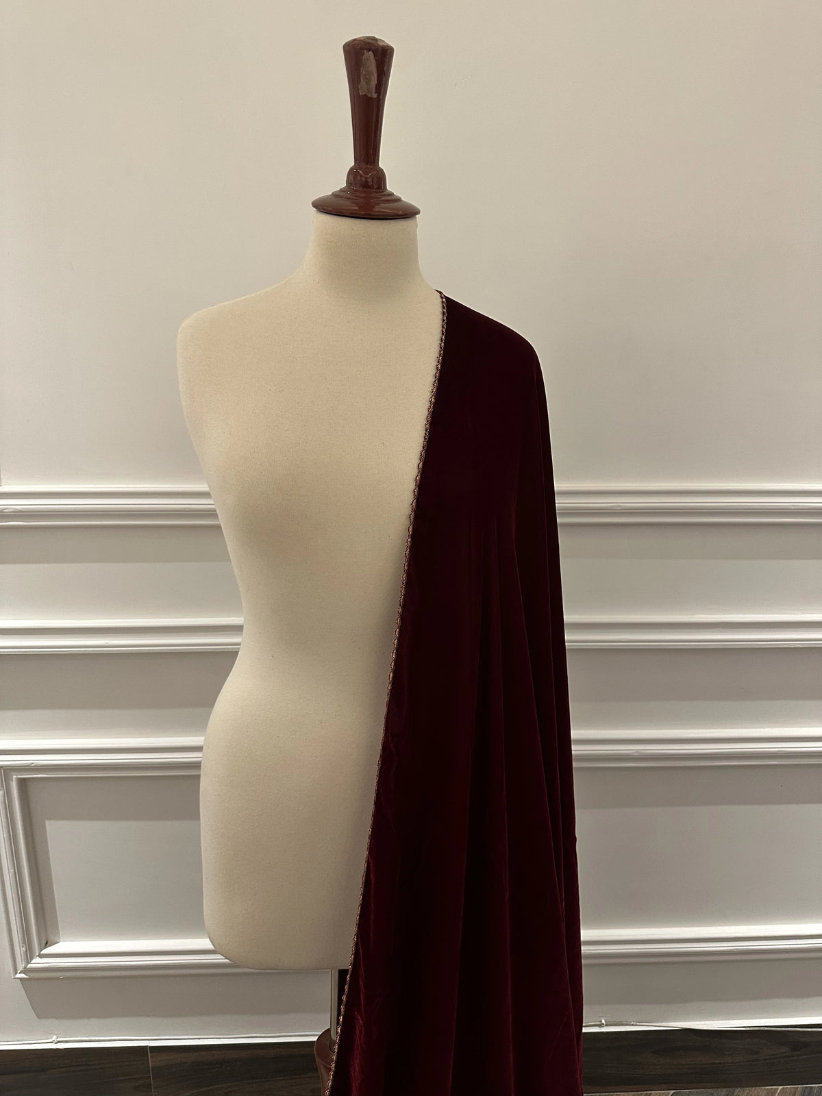 Discover gota embroidered velvet shawl with fully handcrafted motifs on both ends, featuring a rich, elegant finish ideal for weddings and festive wear.