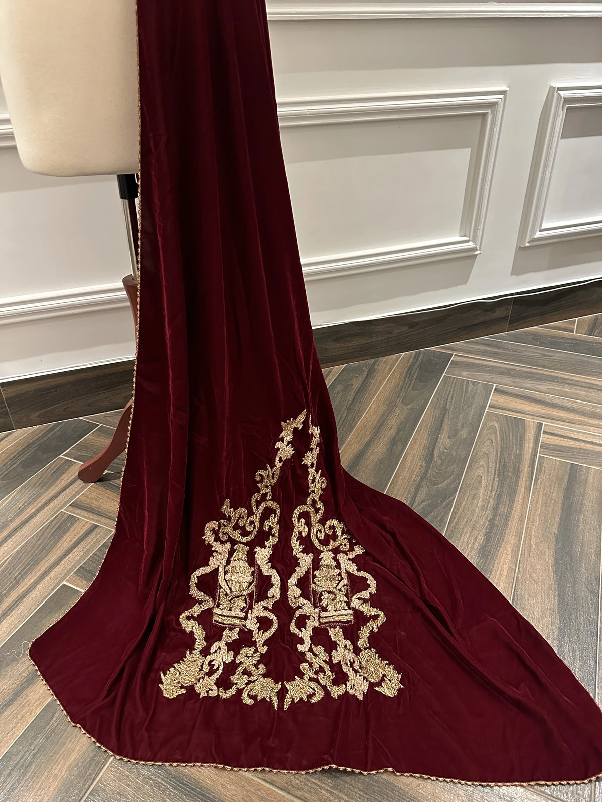 Discover gota embroidered velvet shawl with fully handcrafted motifs on both ends, featuring a rich, elegant finish ideal for weddings and festive wear.