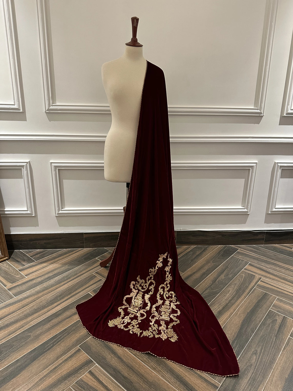 Discover gota embroidered velvet shawl with fully handcrafted motifs on both ends, featuring a rich, elegant finish ideal for weddings and festive wear.