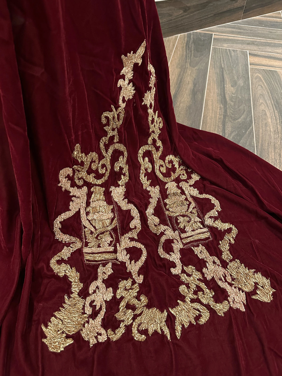 Discover gota embroidered velvet shawl with fully handcrafted motifs on both ends, featuring a rich, elegant finish ideal for weddings and festive wear.