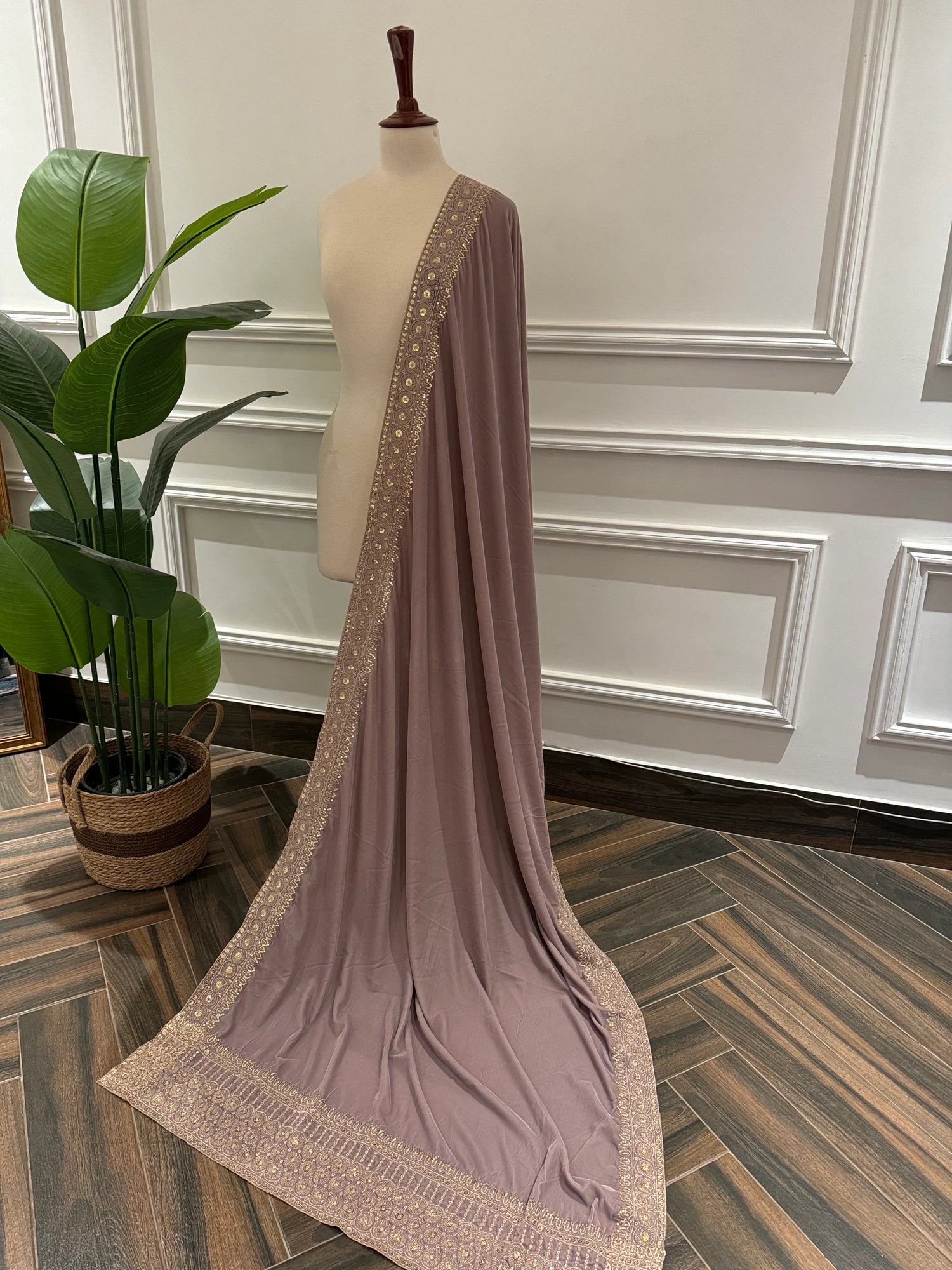 Luxurious lilac velvet shawl adorned with delicate tila and sequin embroidery, showcasing rich texture and refined craftsmanship.