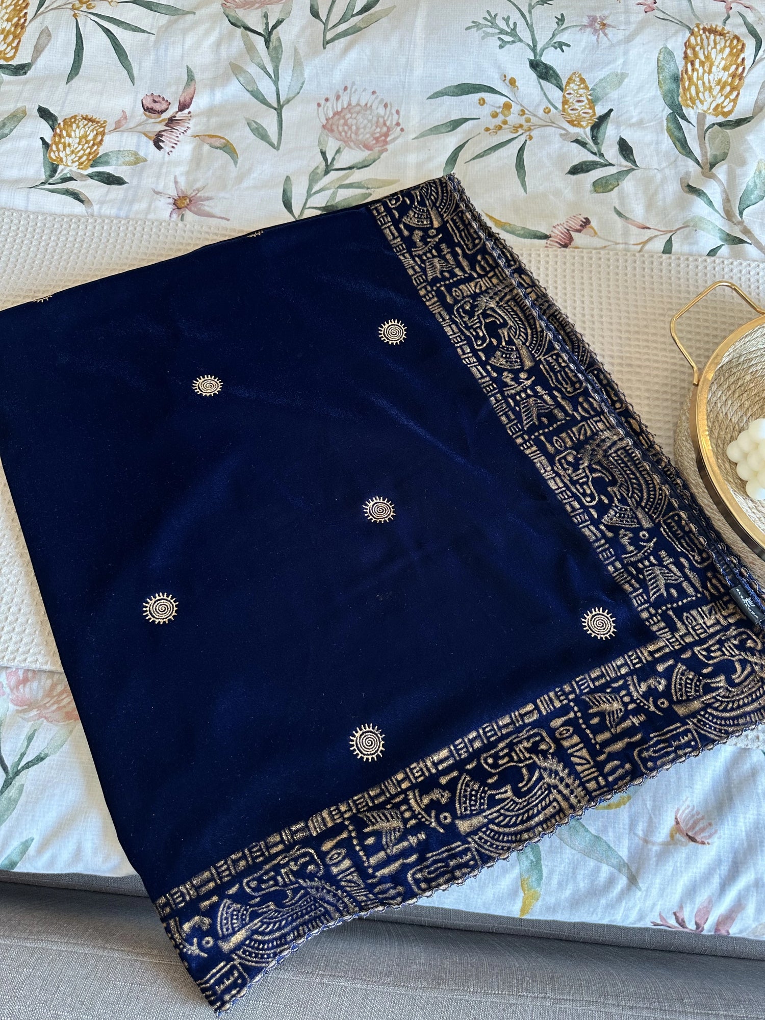 Elegant blue velvet shawl with gold tilla embroidery along a traditional border, featuring an all-over golden motif, perfect for festive and formal occasions.