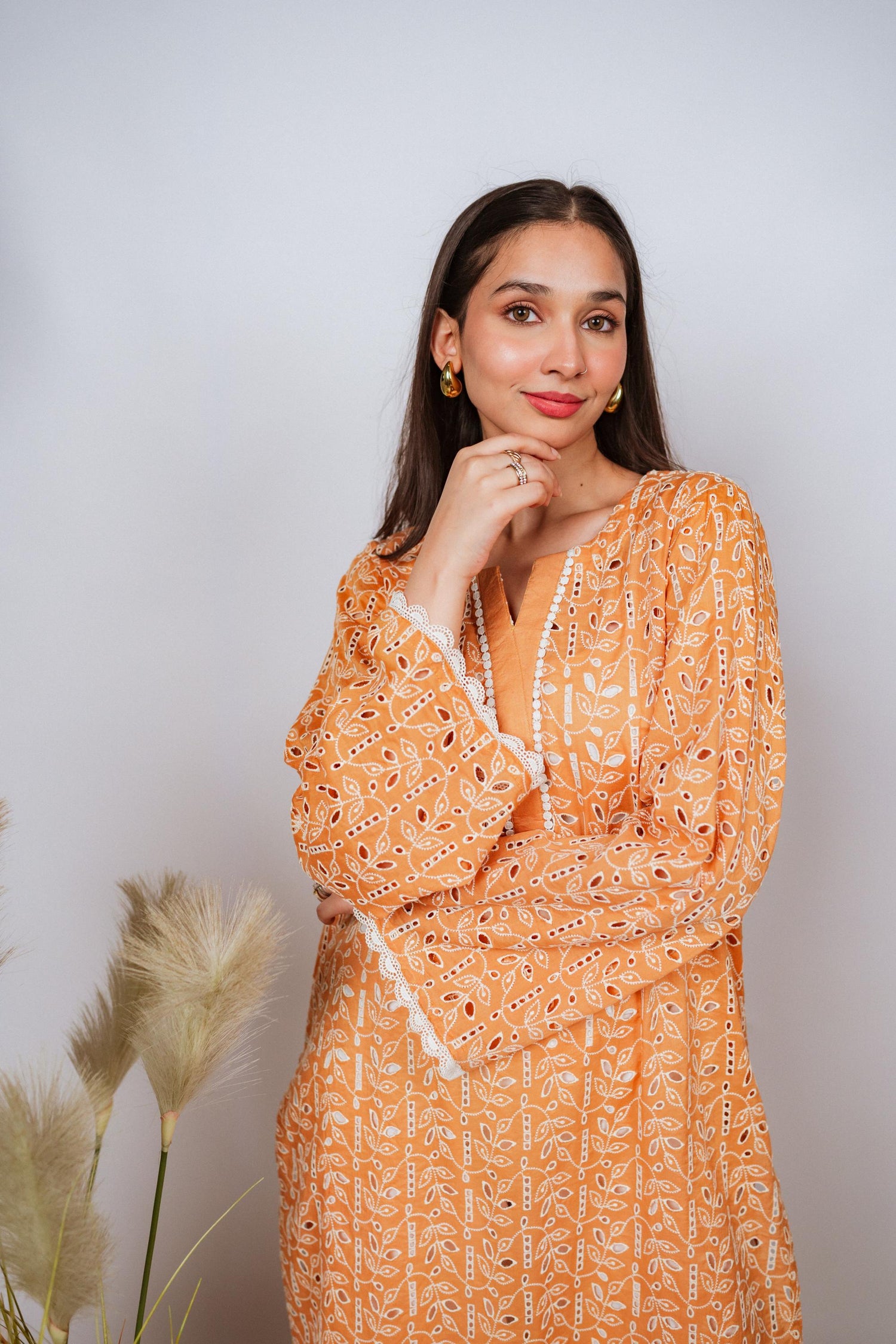 Mustard Chikan kurta with off-white floral embroidery and lace neckline