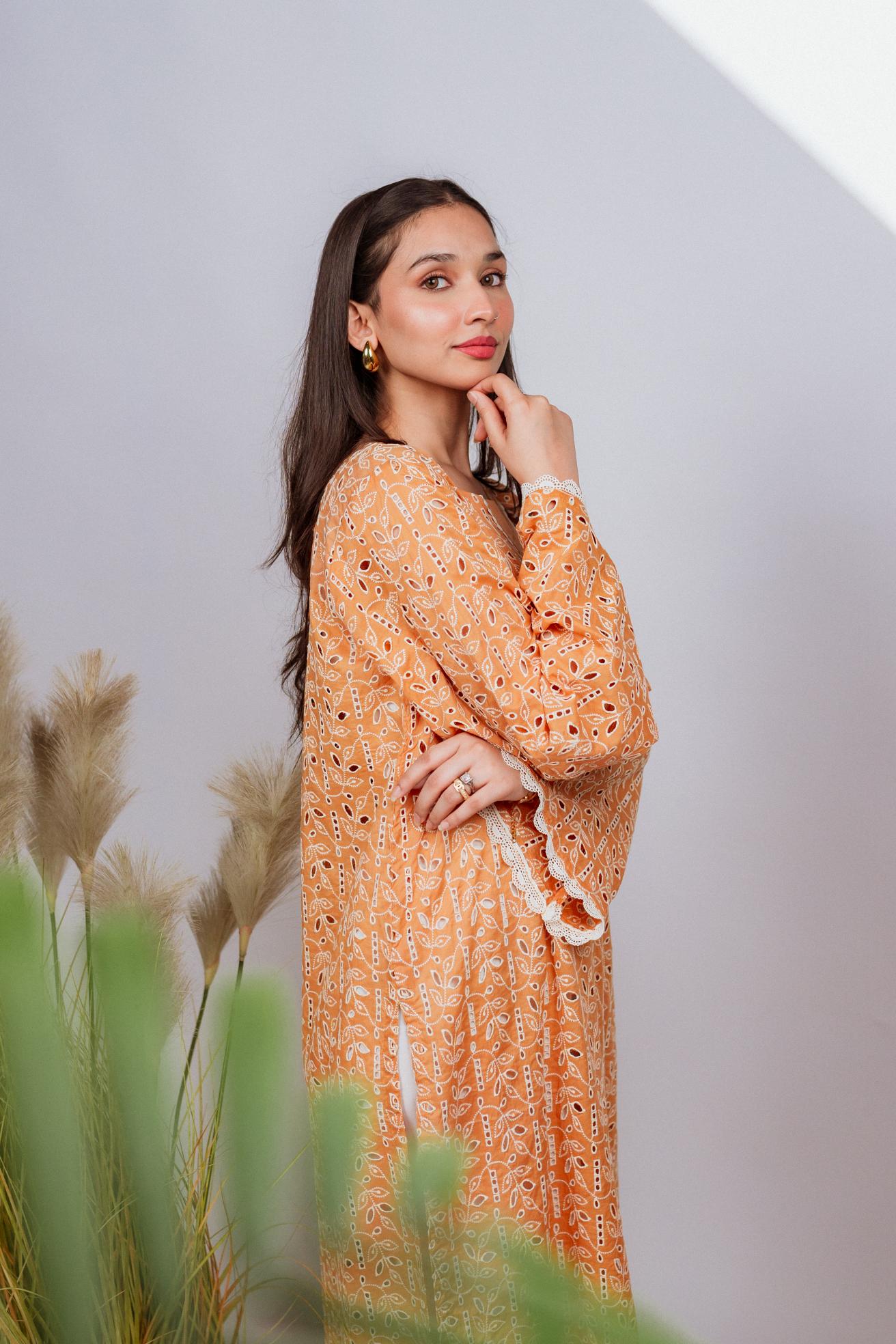 Mustard Chikan kurta with off-white floral embroidery and lace neckline