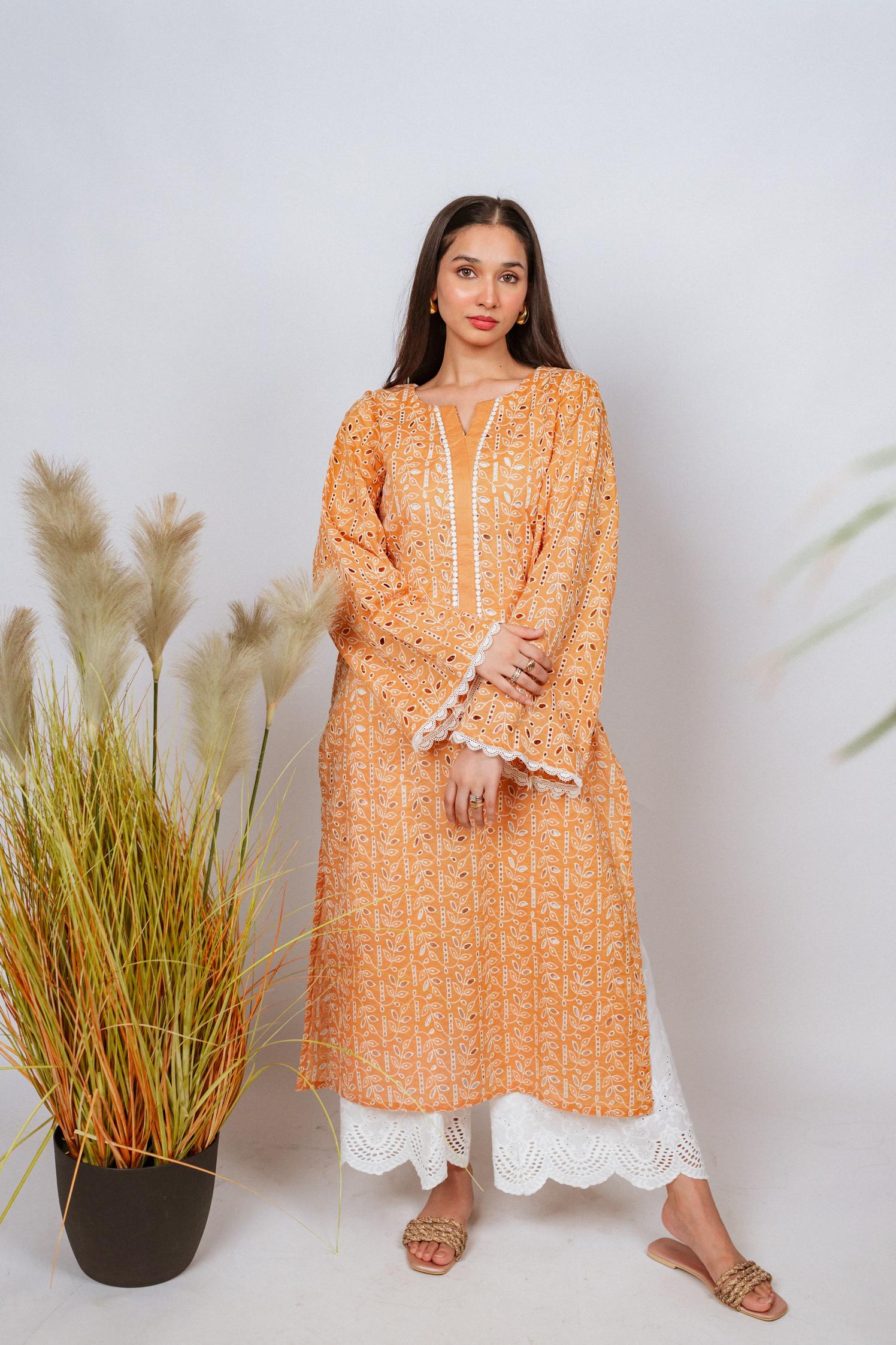 Mustard Chikan kurta with off-white floral embroidery and lace neckline