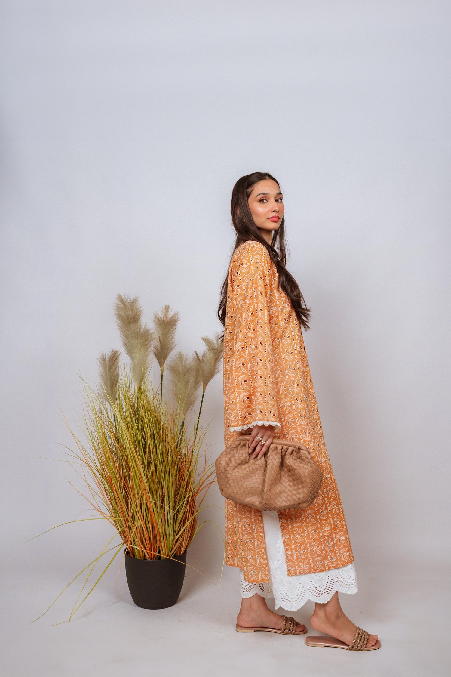 Mustard Chikan kurta with off-white floral embroidery and lace neckline