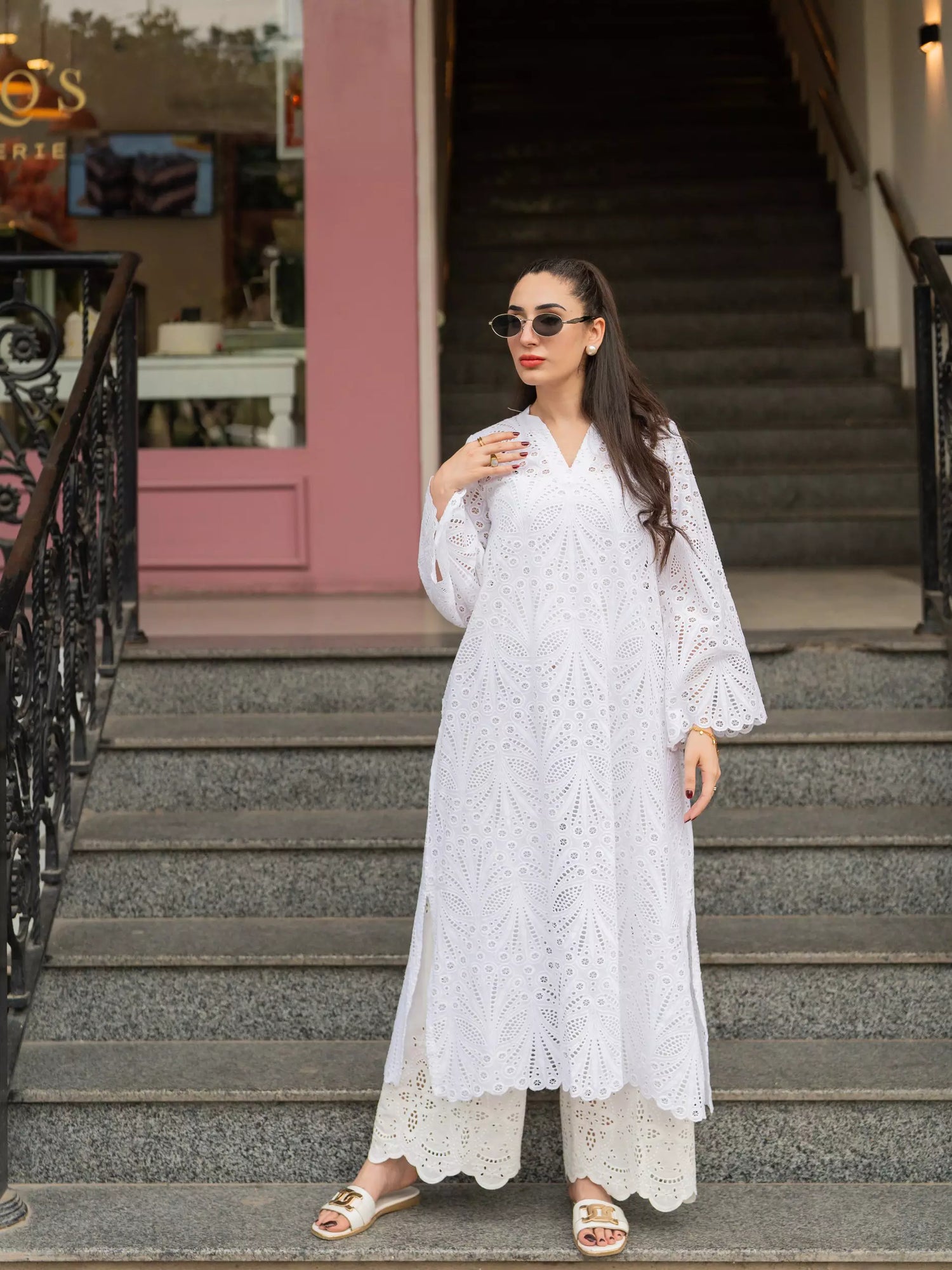 White cutwork kurta with flared sleeves and V-neckline