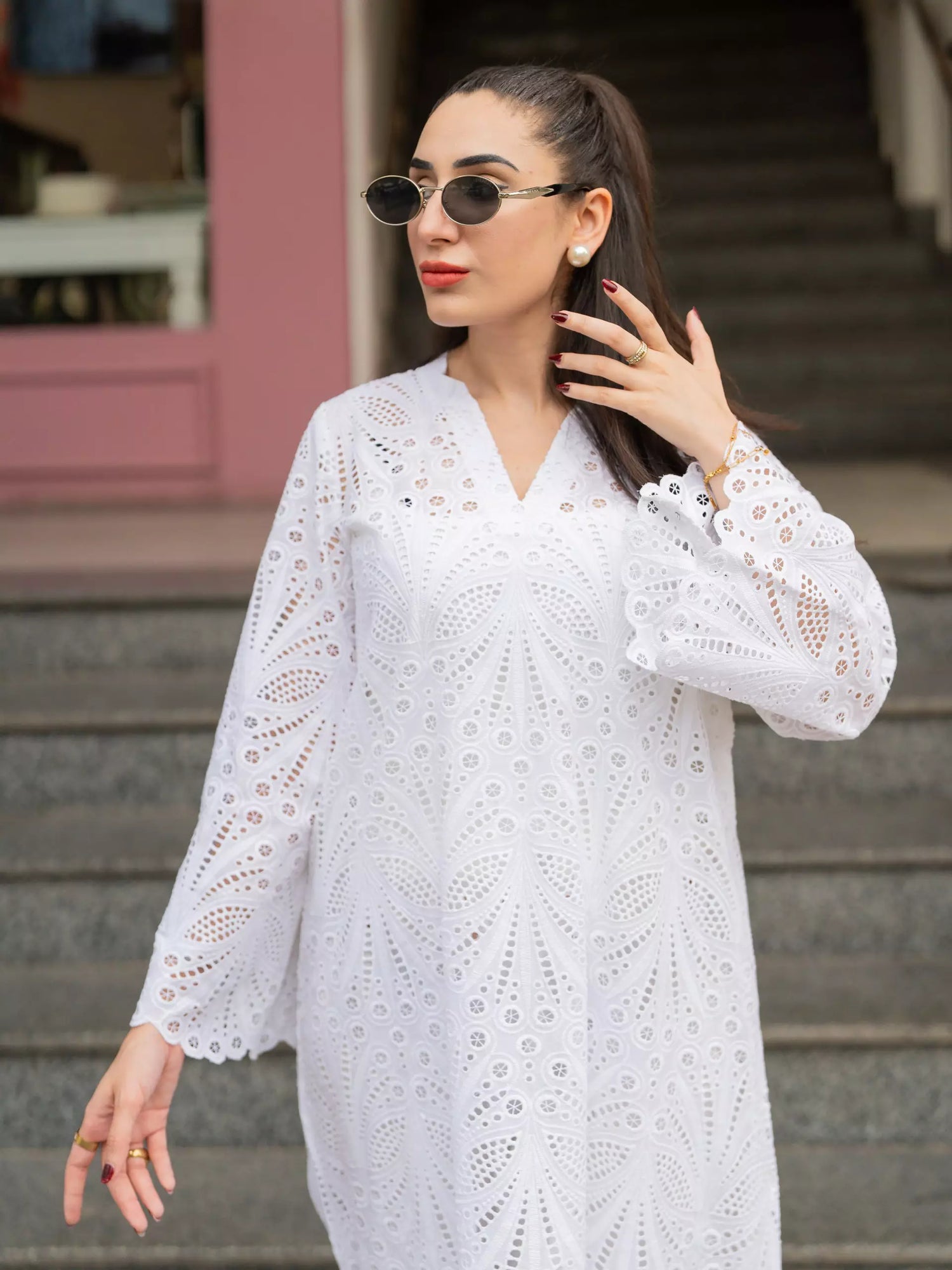 White cutwork kurta with flared sleeves and V-neckline