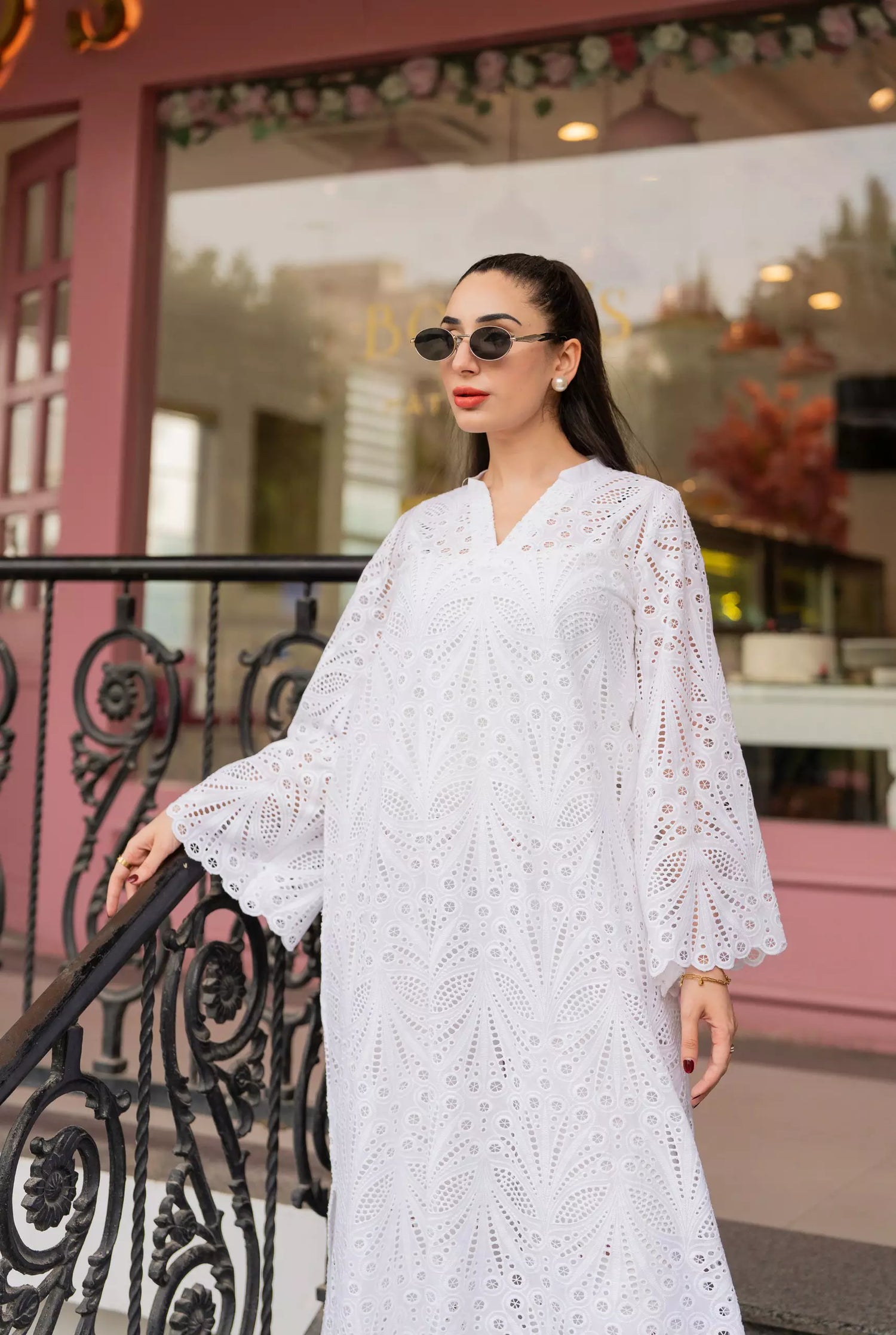 White cutwork kurta with flared sleeves and V-neckline