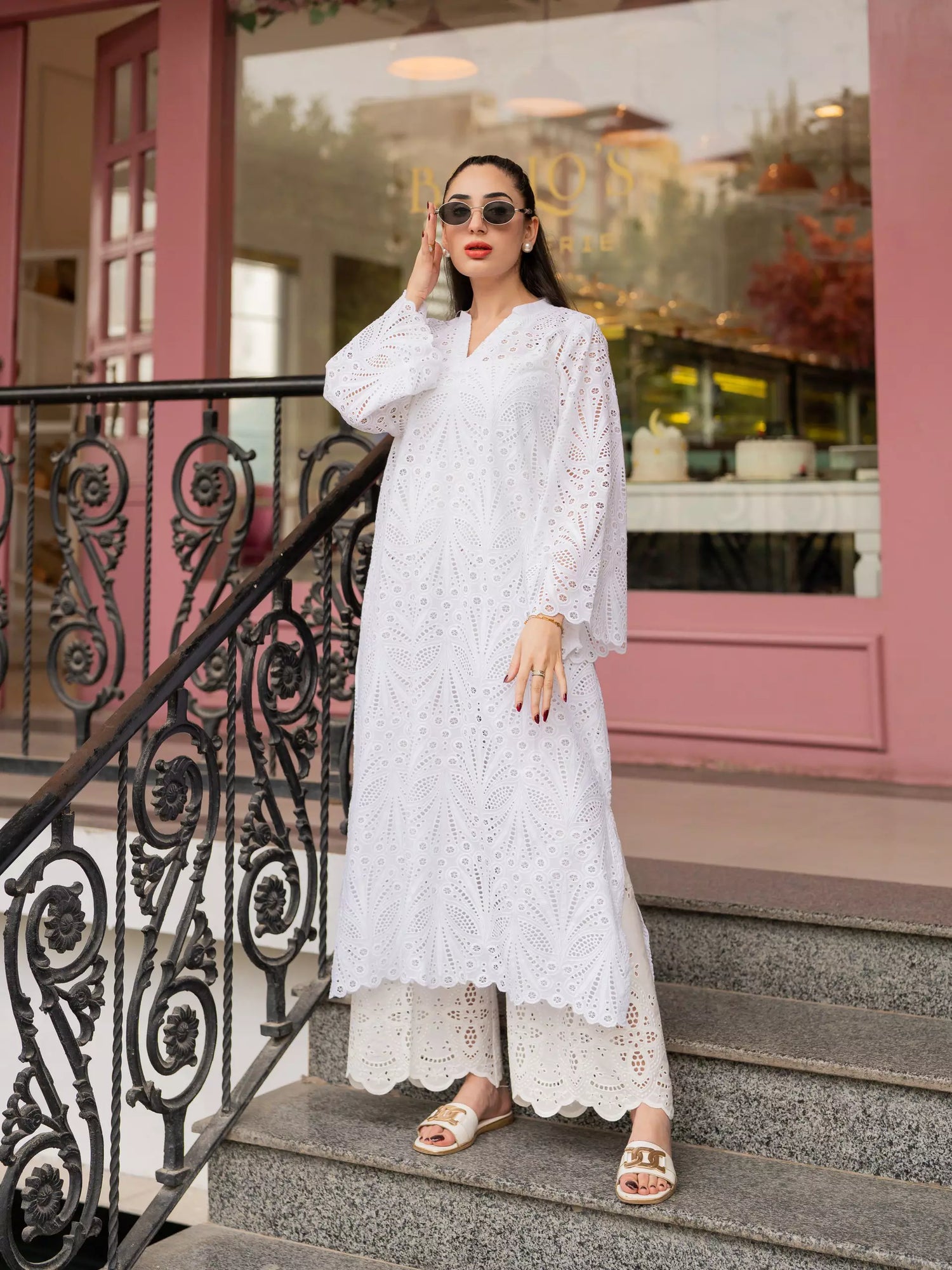 White cutwork kurta with flared sleeves and V-neckline