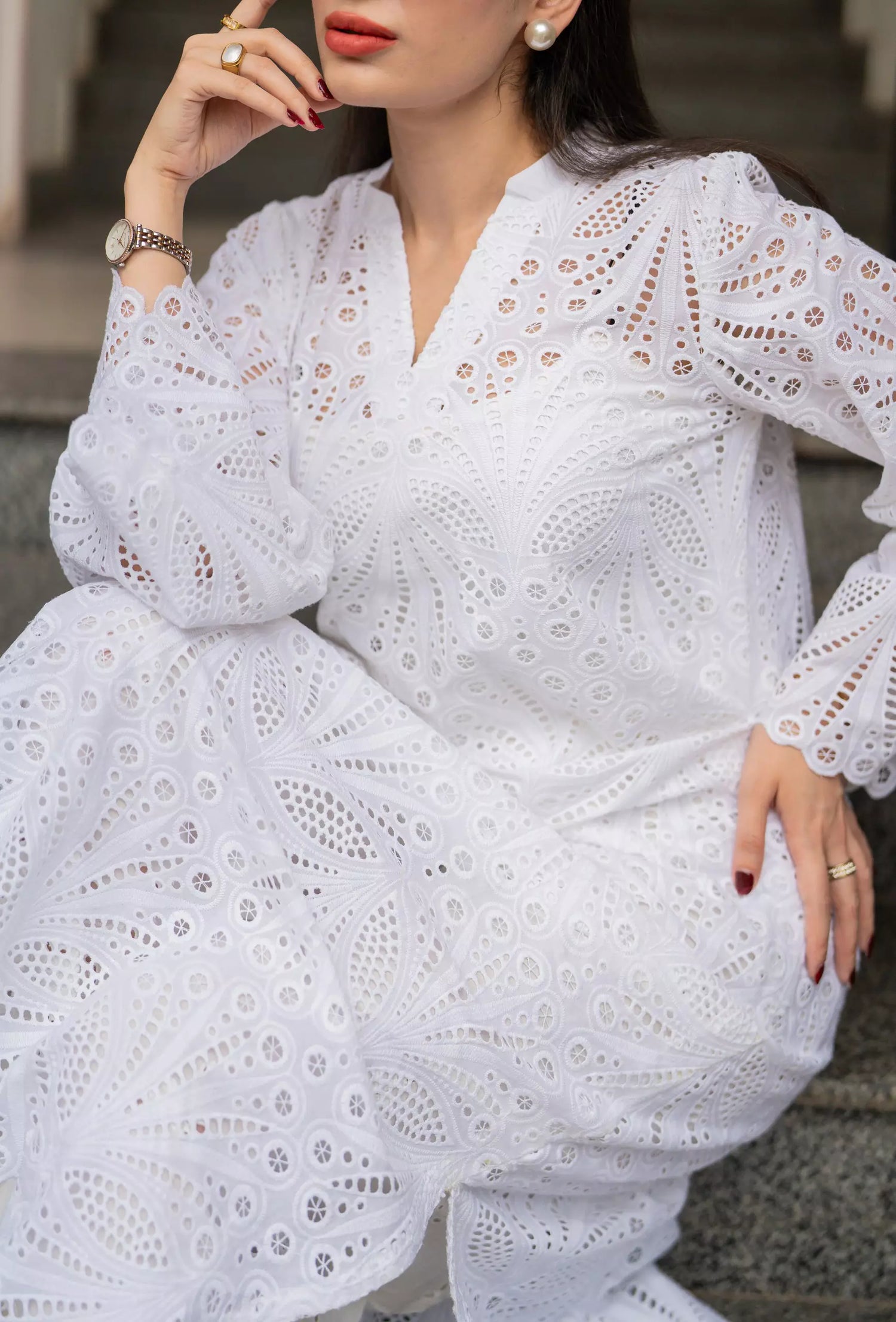 White cutwork kurta with flared sleeves and V-neckline