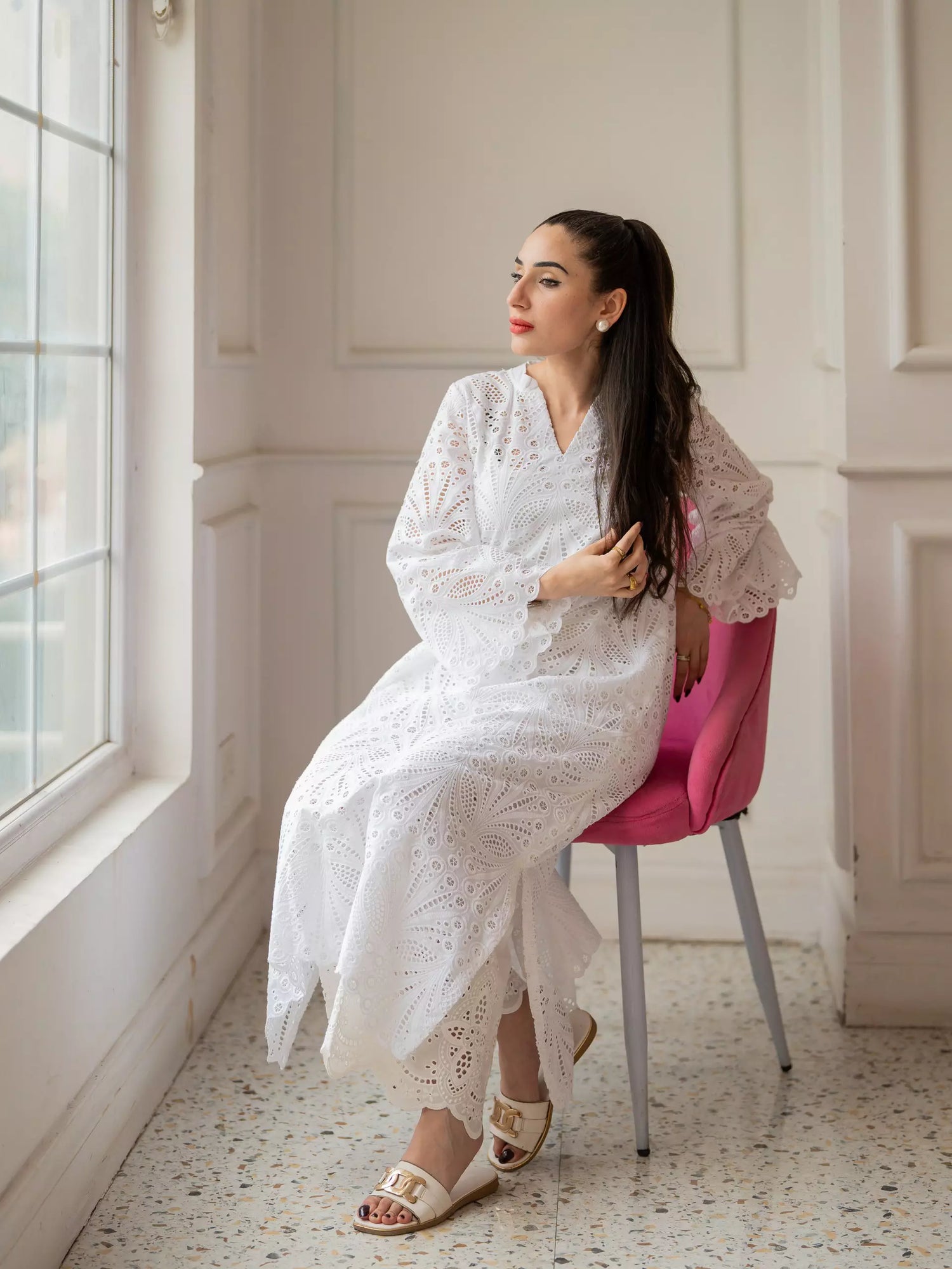 White cutwork kurta with flared sleeves and V-neckline