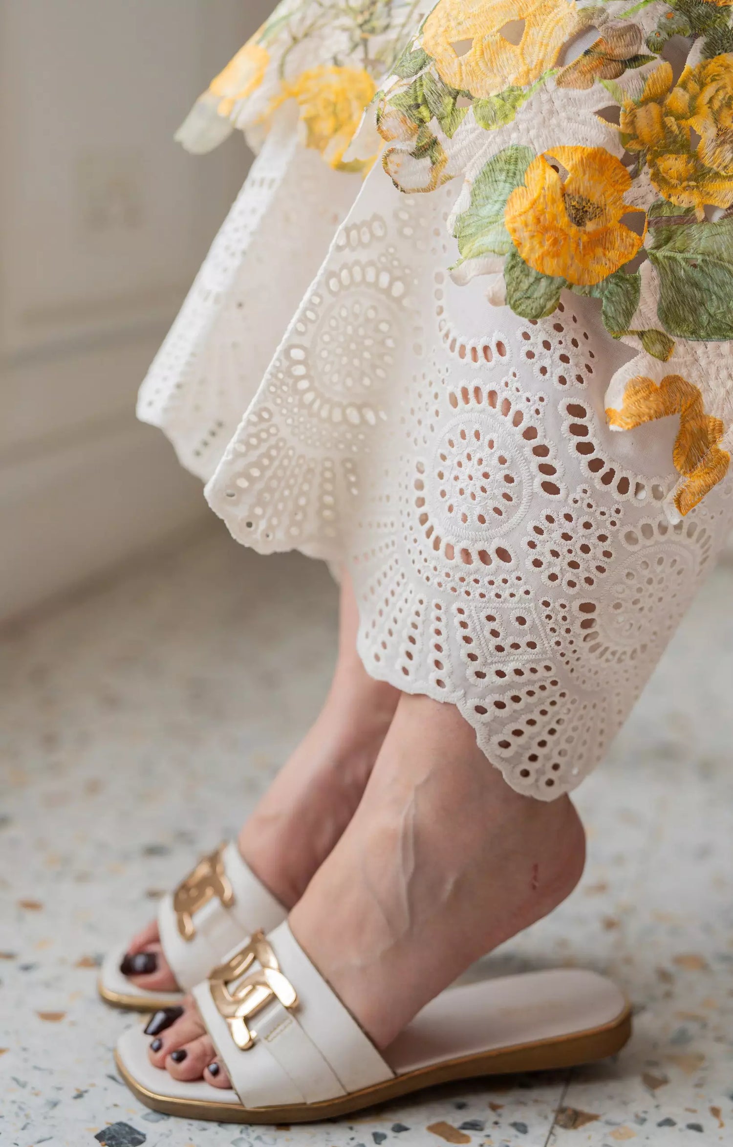 White Schiffli chikan trousers with embroidered hem