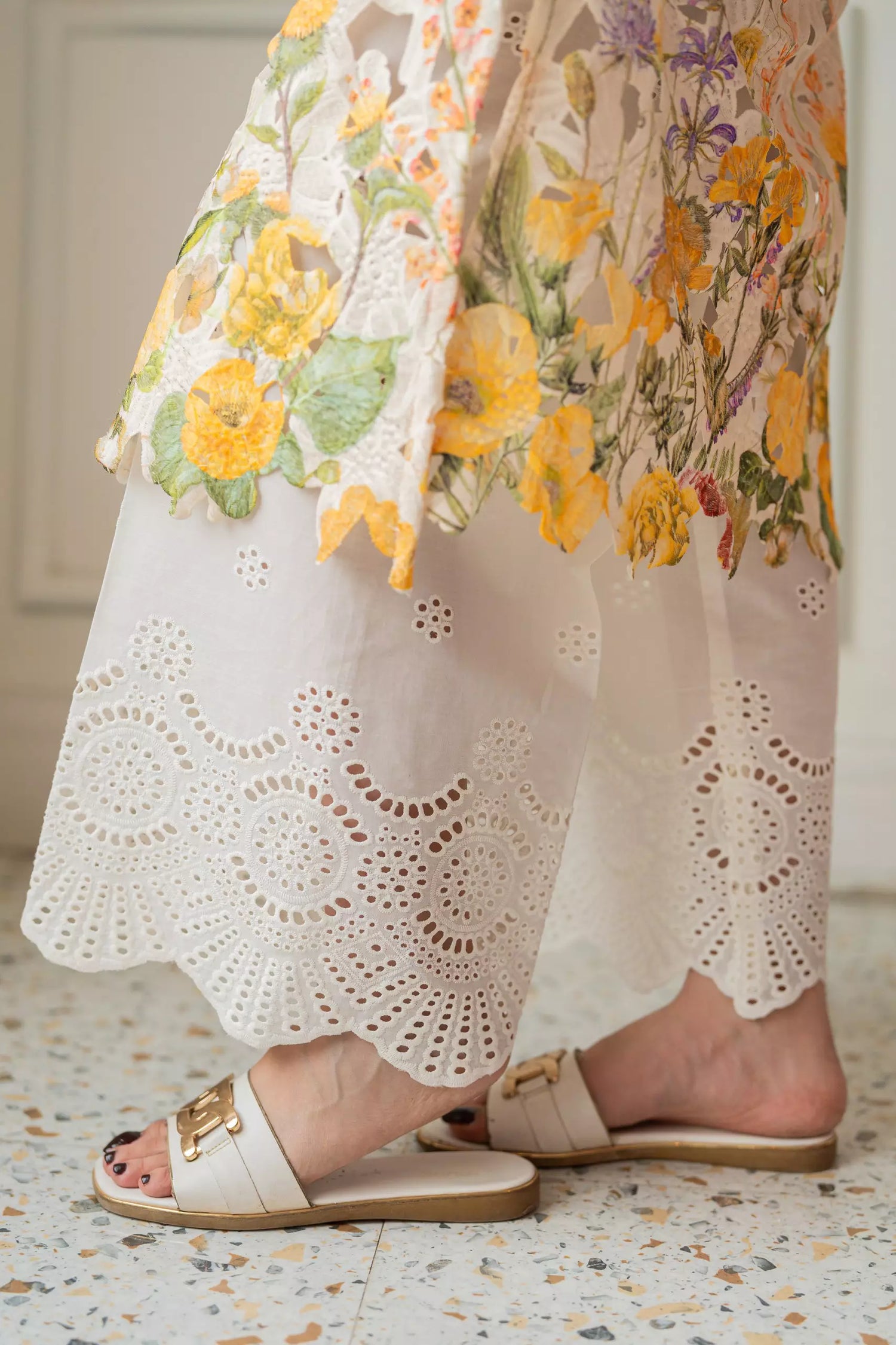 White Schiffli chikan trousers with embroidered hem