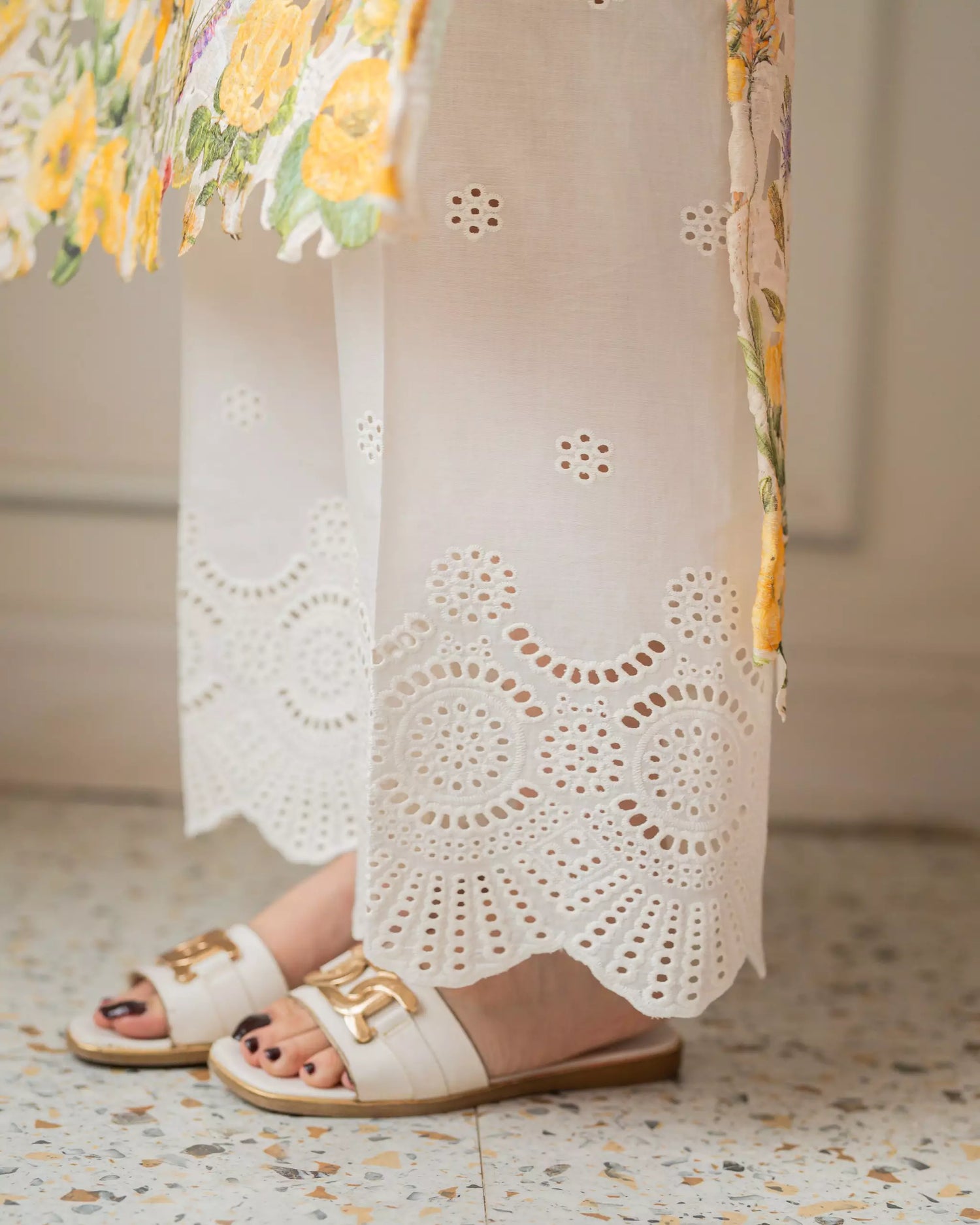 White Schiffli chikan trousers with embroidered hem