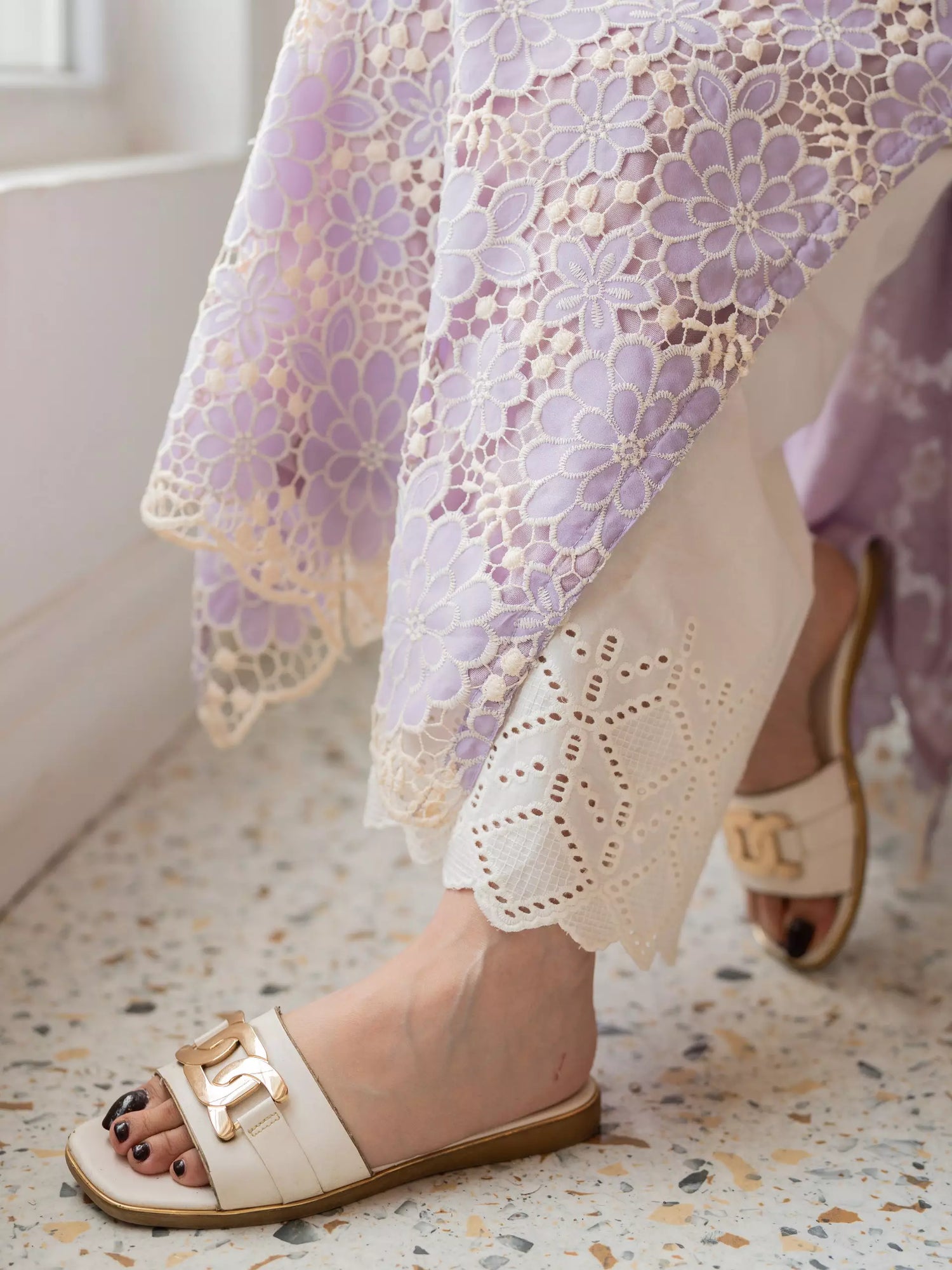 Flared cotton Chikankari trousers with embroidered hem