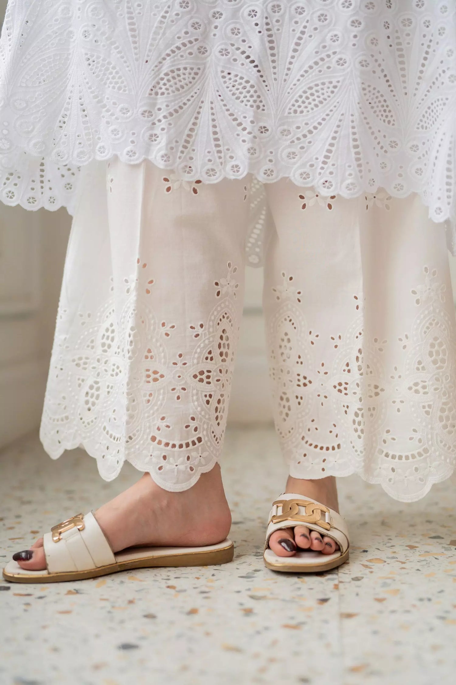 White Schiffli chikankari straight-fit trousers with embroidered hem